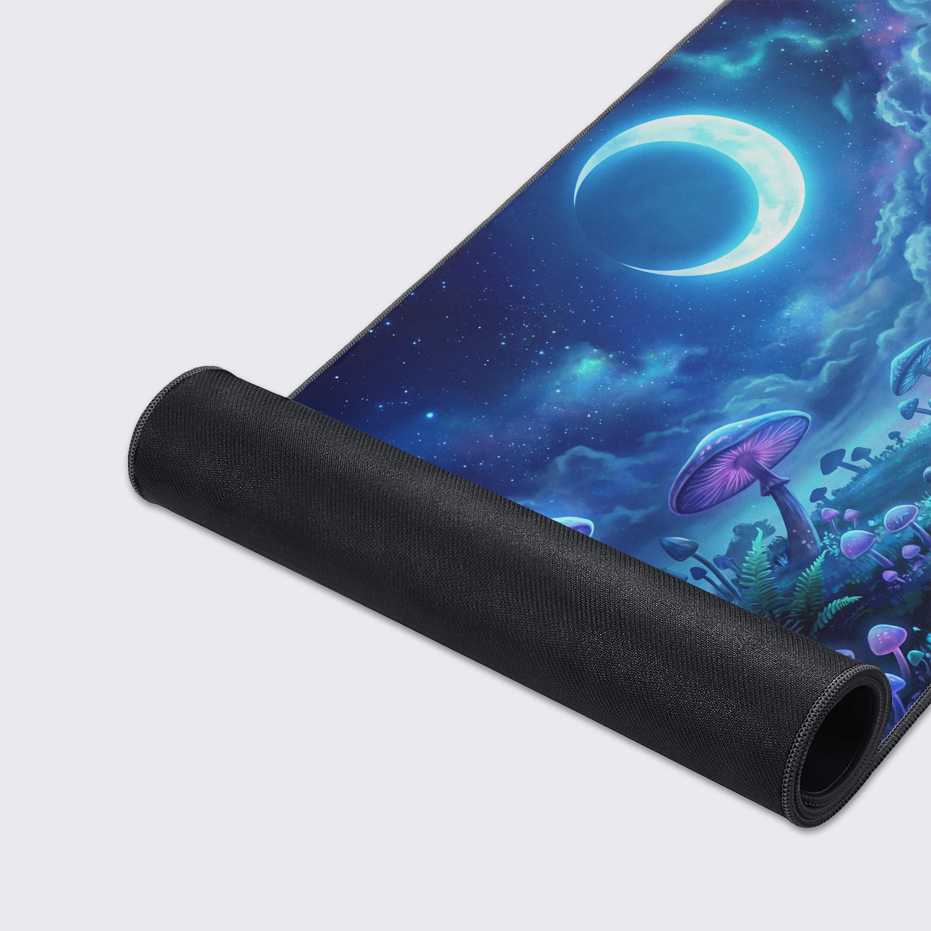 Close-up of the Lunar Fungi gaming desk mat showing the smooth fabric texture and durable stitched edges, highlighting the vibrant bioluminescent artwork. - Epic Design Pads & Mousepads