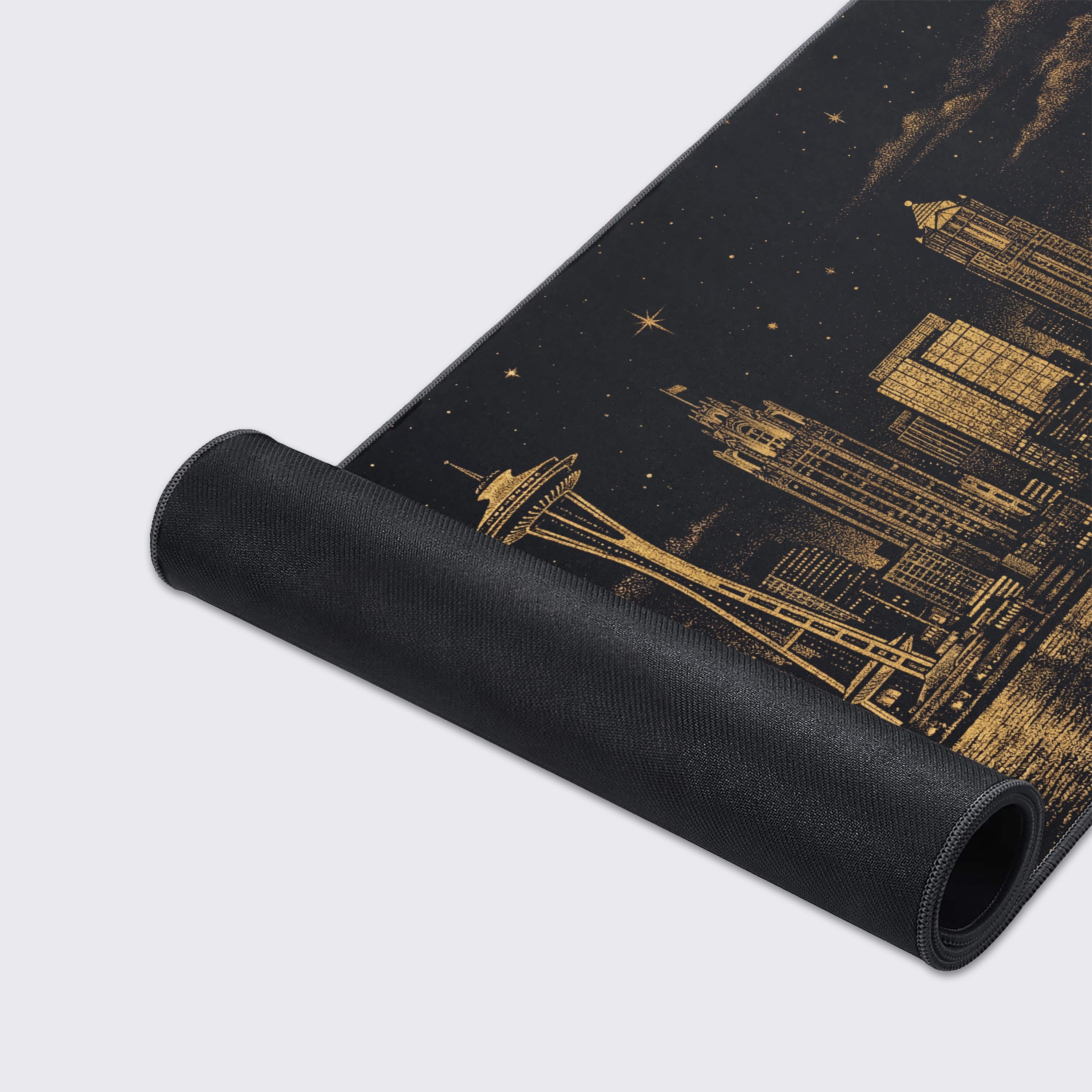 Close-up of the Golden Skyline gaming desk mat, highlighting the detailed pointillist art style, stitched edges, and smooth fabric texture of the Seattle skyline design. - Epic Design Pads & Mousepads