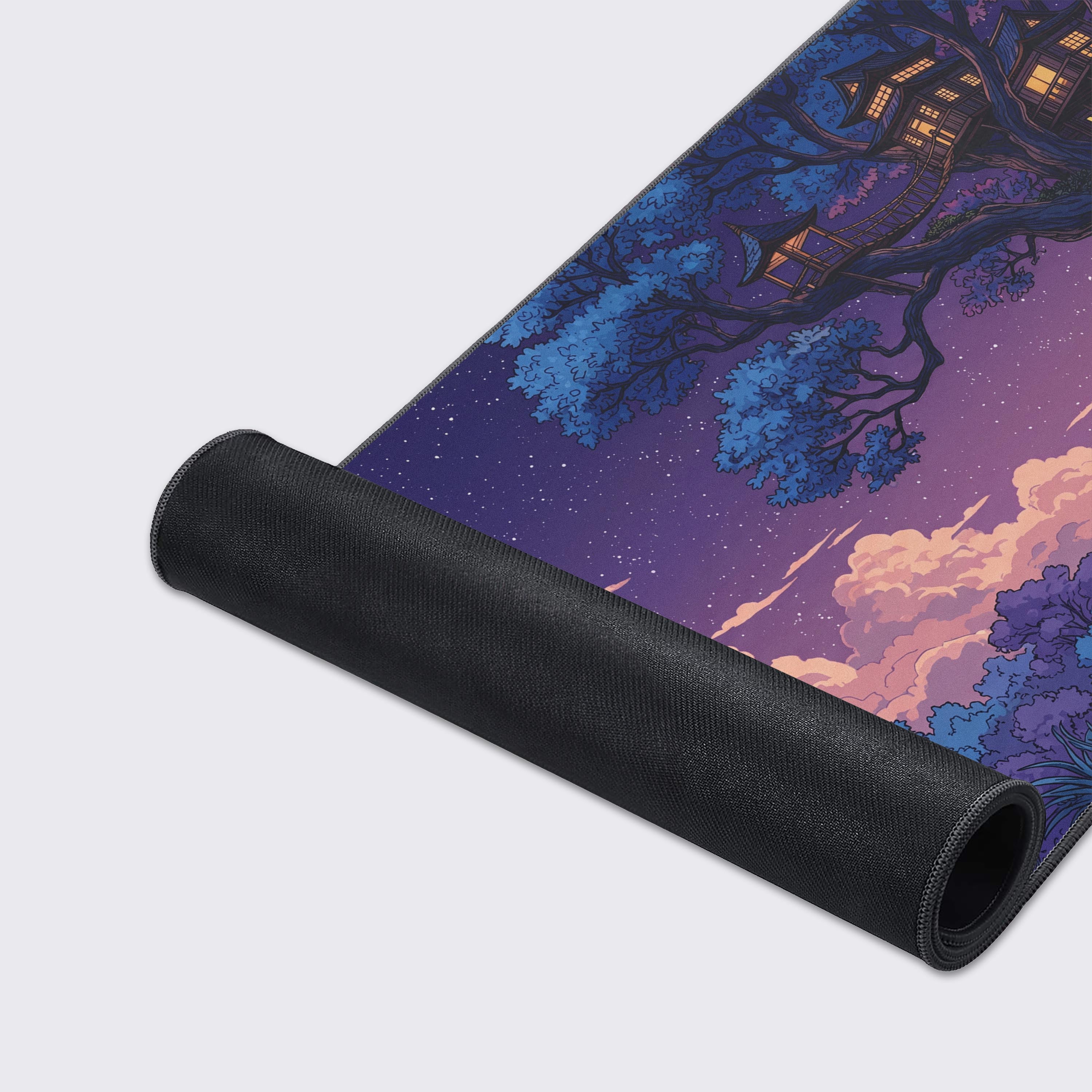 Close-up of the Dreamer's Ascent gaming desk mat highlighting the smooth fabric texture and durable stitched edges of the fantasy treehouse design. - Epic Design Pads & Mousepads