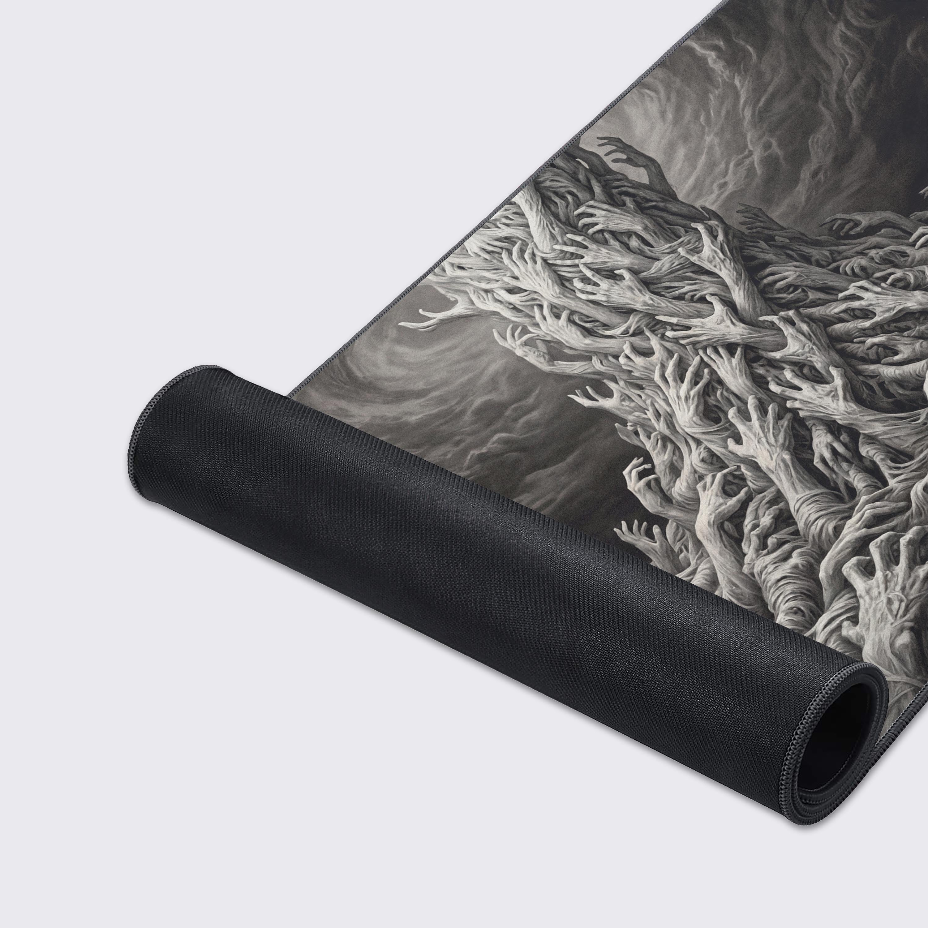 Close-up of the Legion of Hands gaming desk mat, highlighting the fine texture, durable stitched edges, and the detailed, monochromatic artwork of countless intertwined hands. - Epic Design Pads & Mousepads