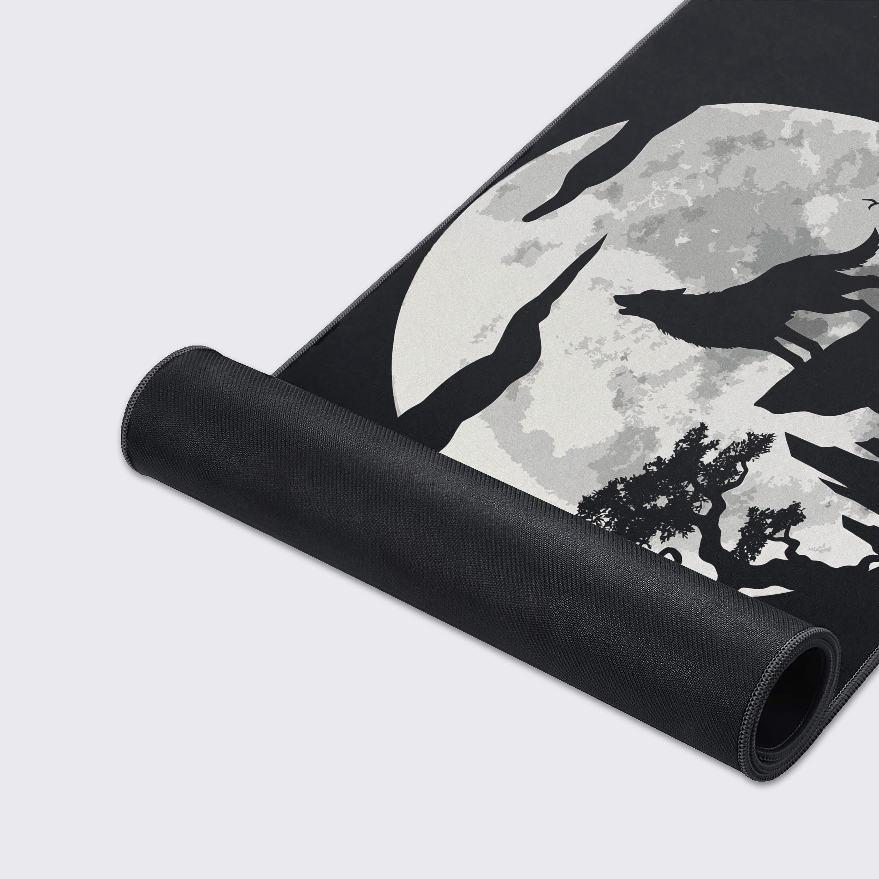 Close-up of the Shadow Howl mouse pad, showcasing its smooth fabric texture and durable stitched edges. The detailed wolf silhouette design is clearly visible. - Epic Design Pads & Mousepads