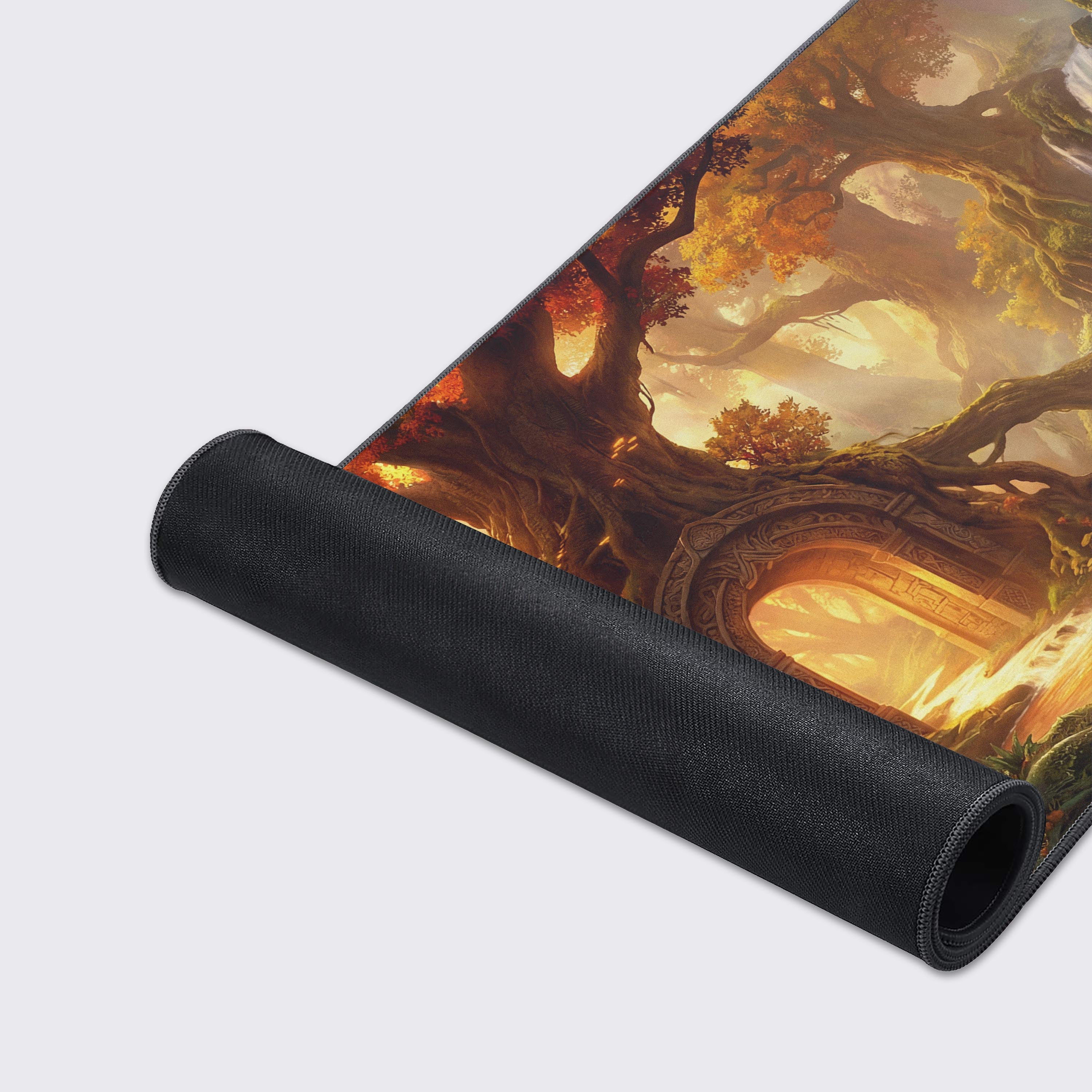 A close-up of the Eternal Gateway Gaming Desk Mat highlighting the high-quality fabric texture, stitched edges, and vibrant fantasy landscape artwork. - Epic Design Pads & Mousepads