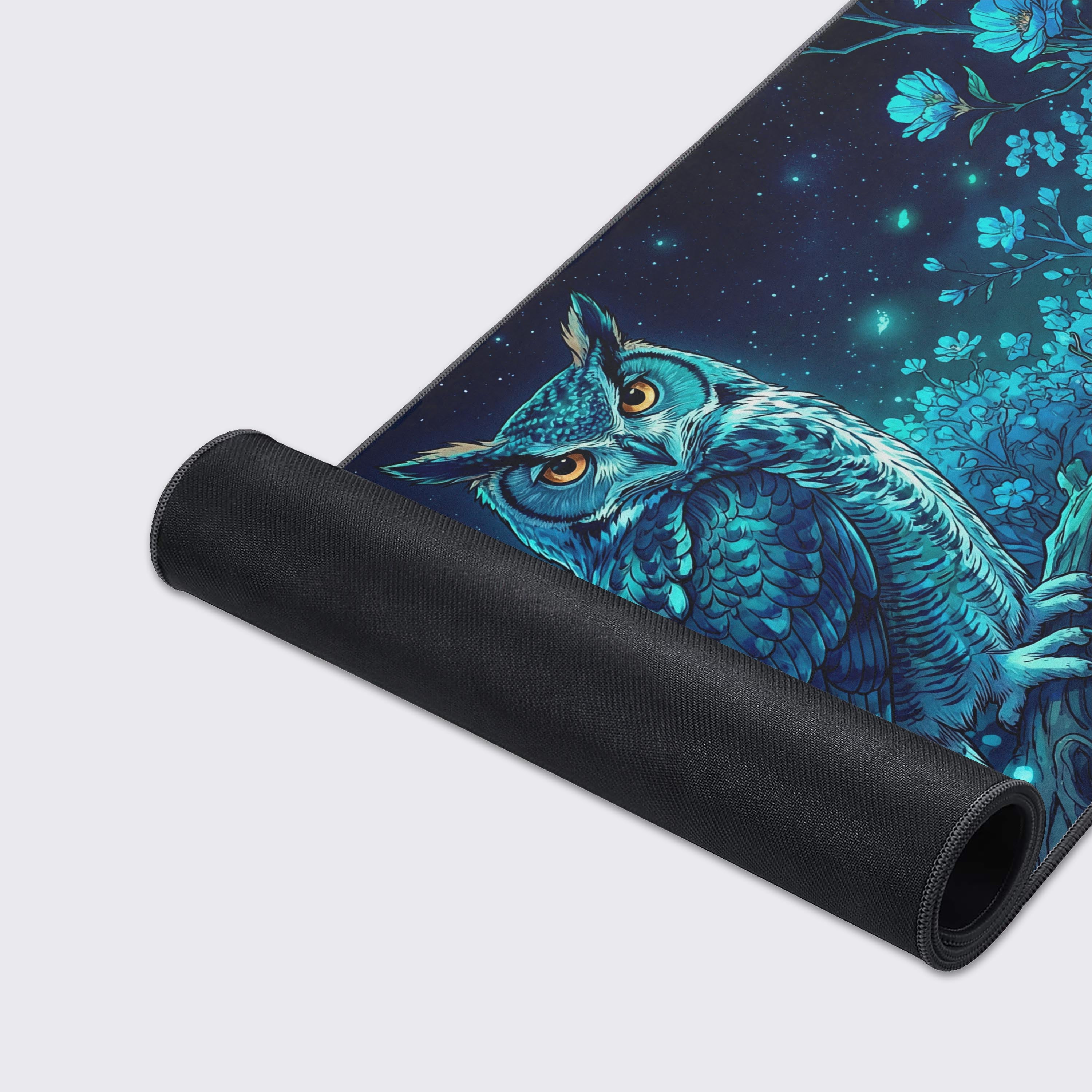 Close-up of the Nocturnal Wisdom mouse pad's high-quality fabric texture and durable stitched edges, highlighting the detailed blue owl artwork. - Epic Design Pads & Mousepads