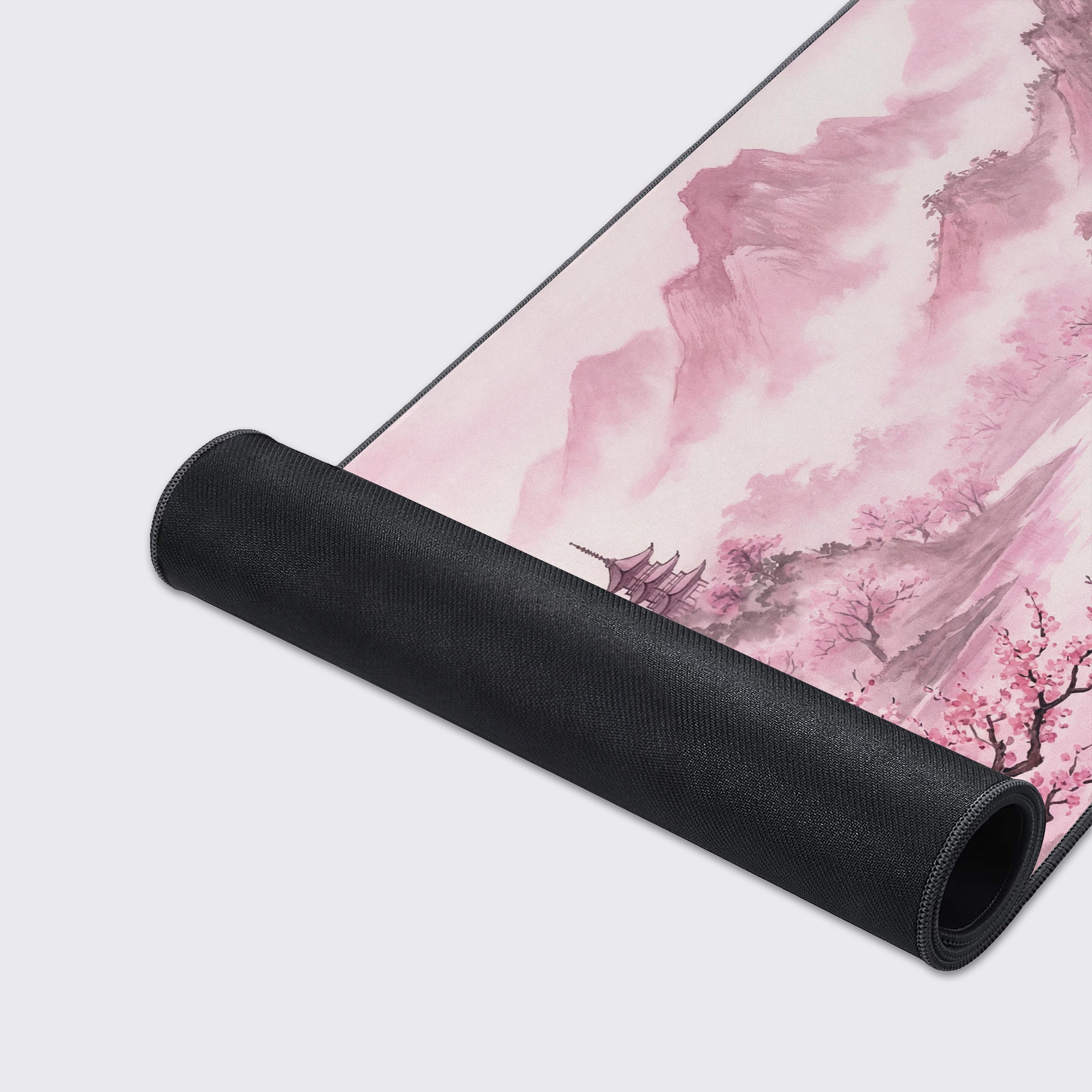 Close-up of the Eternal Spring Valley mouse pad's smooth fabric texture and durable stitched edges, highlighting the detailed pink sakura artwork. - Epic Design Pads & Mousepads