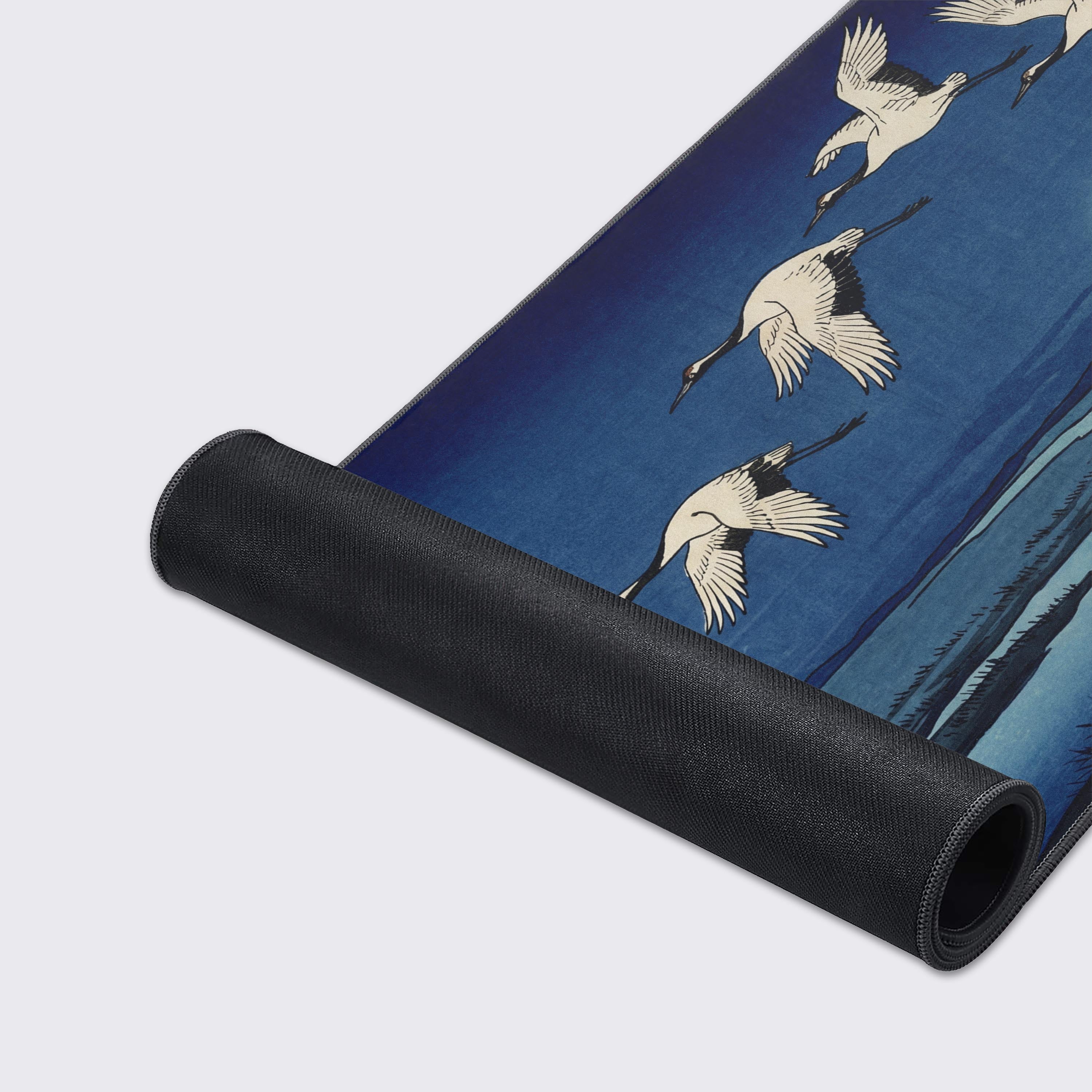 Close-up of the Silent Migration gaming desk mat, showing the high-quality fabric texture and durable stitched edges. The detailed Ukiyo-e crane artwork is clearly visible. - Epic Design Pads & Mousepads