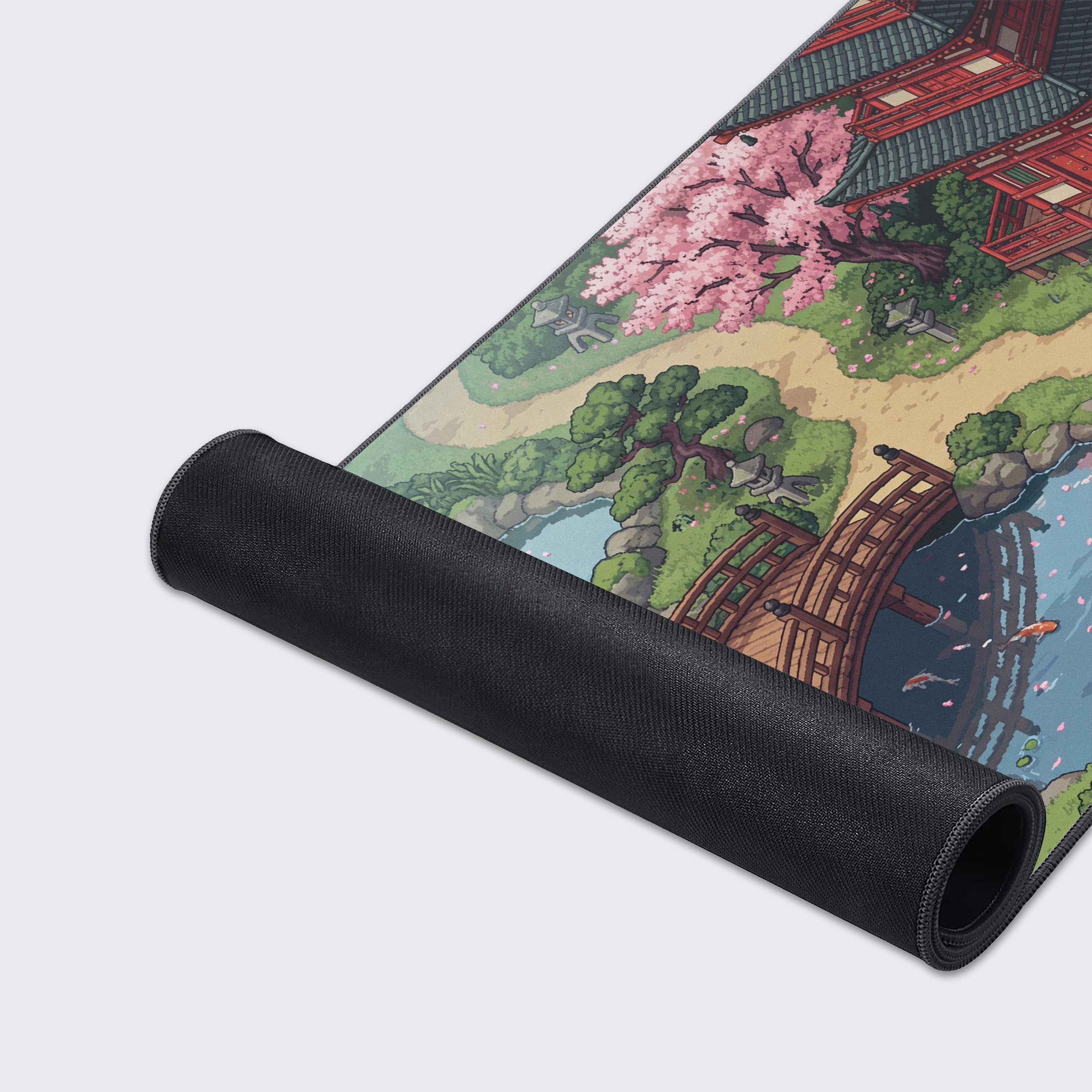 A close-up showcase of the durable stitched edges and smooth fabric texture on the Retro Sakura Path gaming desk mat. - Epic Design Pads & Mousepads