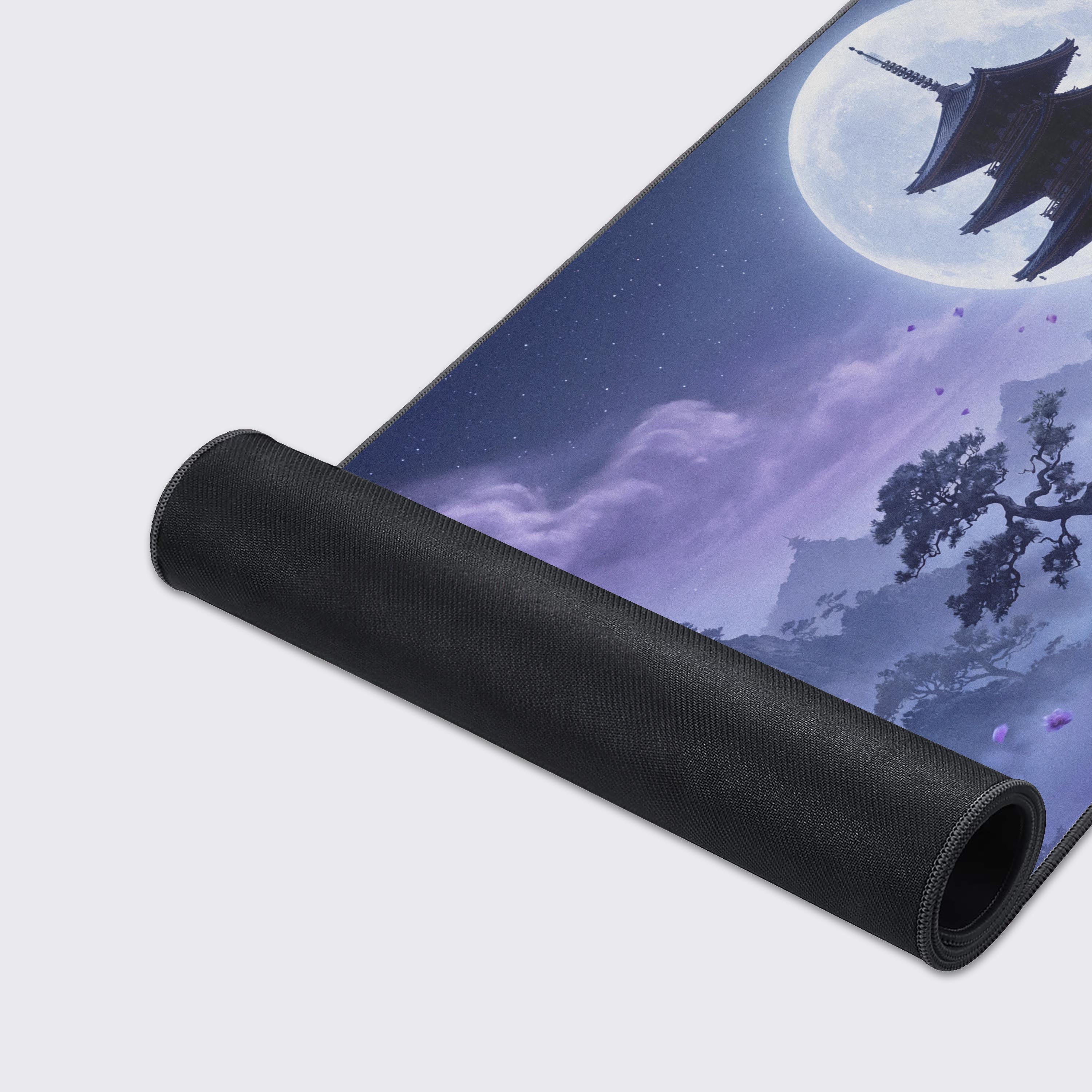 Close-up of the Lunar Zen gaming desk mat's high-quality fabric texture and stitched edges, highlighting the detailed art of the serene Japanese temple under a full moon. - Epic Design Pads & Mousepads
