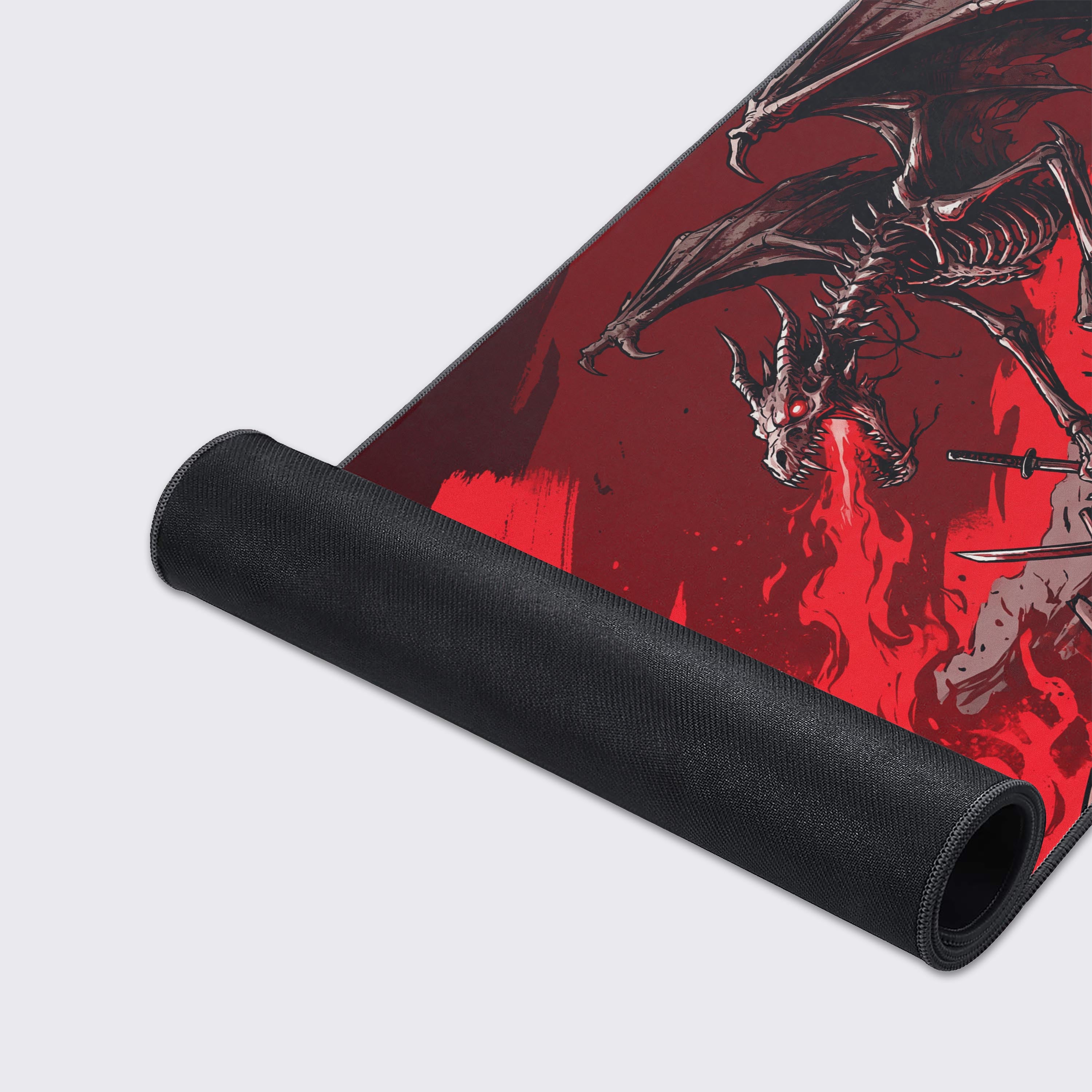 Close-up of the Bone Tyrant gaming desk mat's high-quality fabric texture and stitched edges, showcasing the detailed skeletal dragon and samurai artwork. - Epic Design Pads & Mousepads