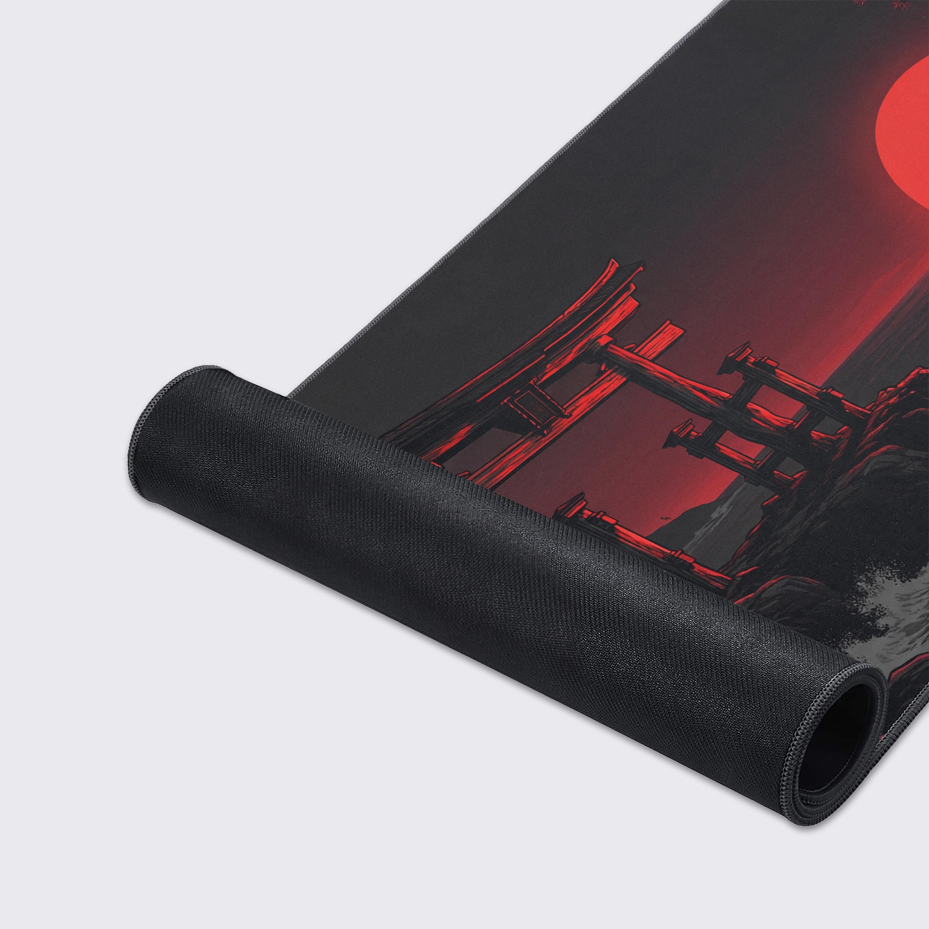 Close-up of the Crimson Threshold mouse pad's smooth fabric texture and stitched edges, highlighting the detailed Japanese ocean and red sun artwork. - Epic Design Pads & Mousepads