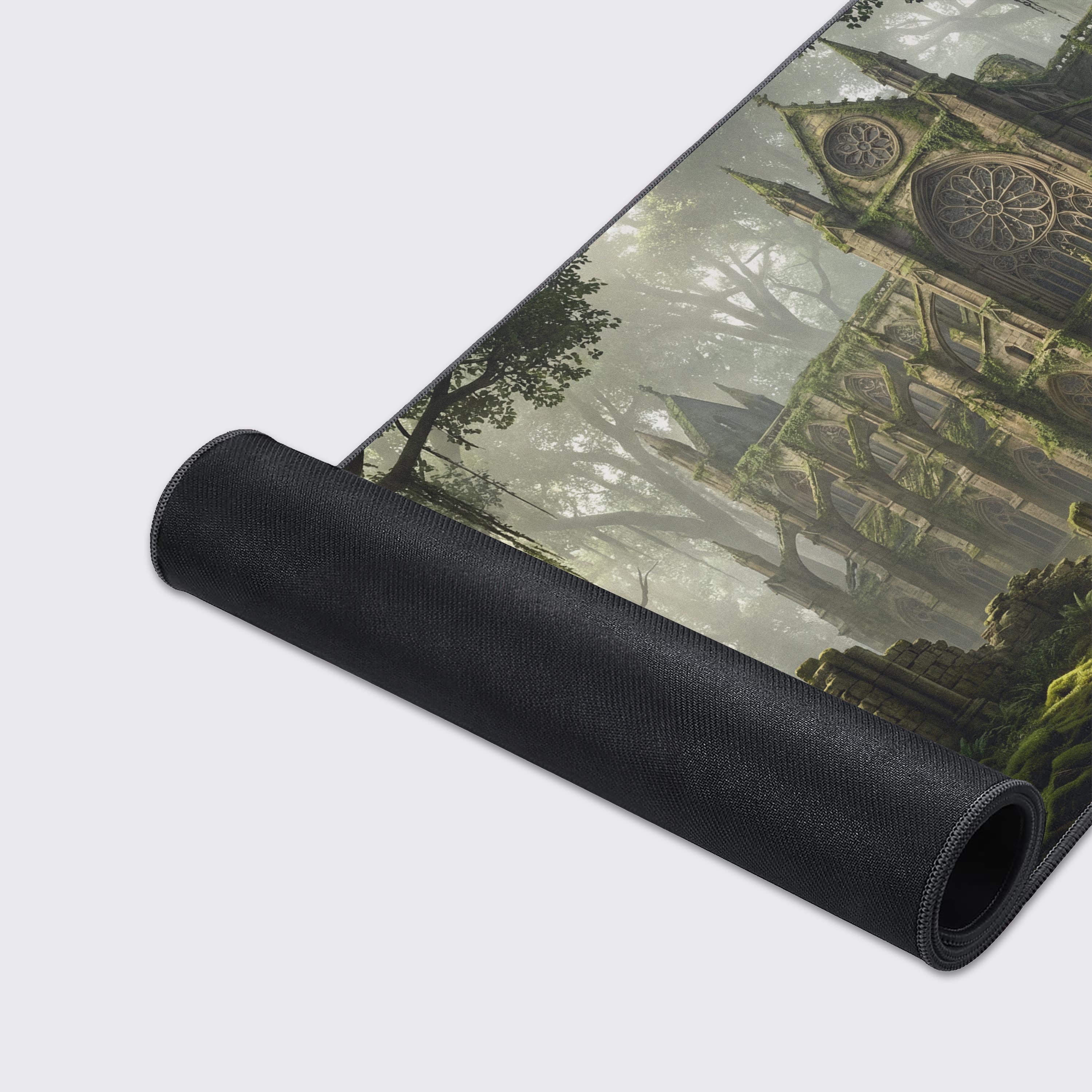 A close-up of the Verdant Ruins mouse pad highlighting the quality stitched edges and smooth fabric texture of the mossy cathedral artwork. - Epic Design Pads & Mousepads