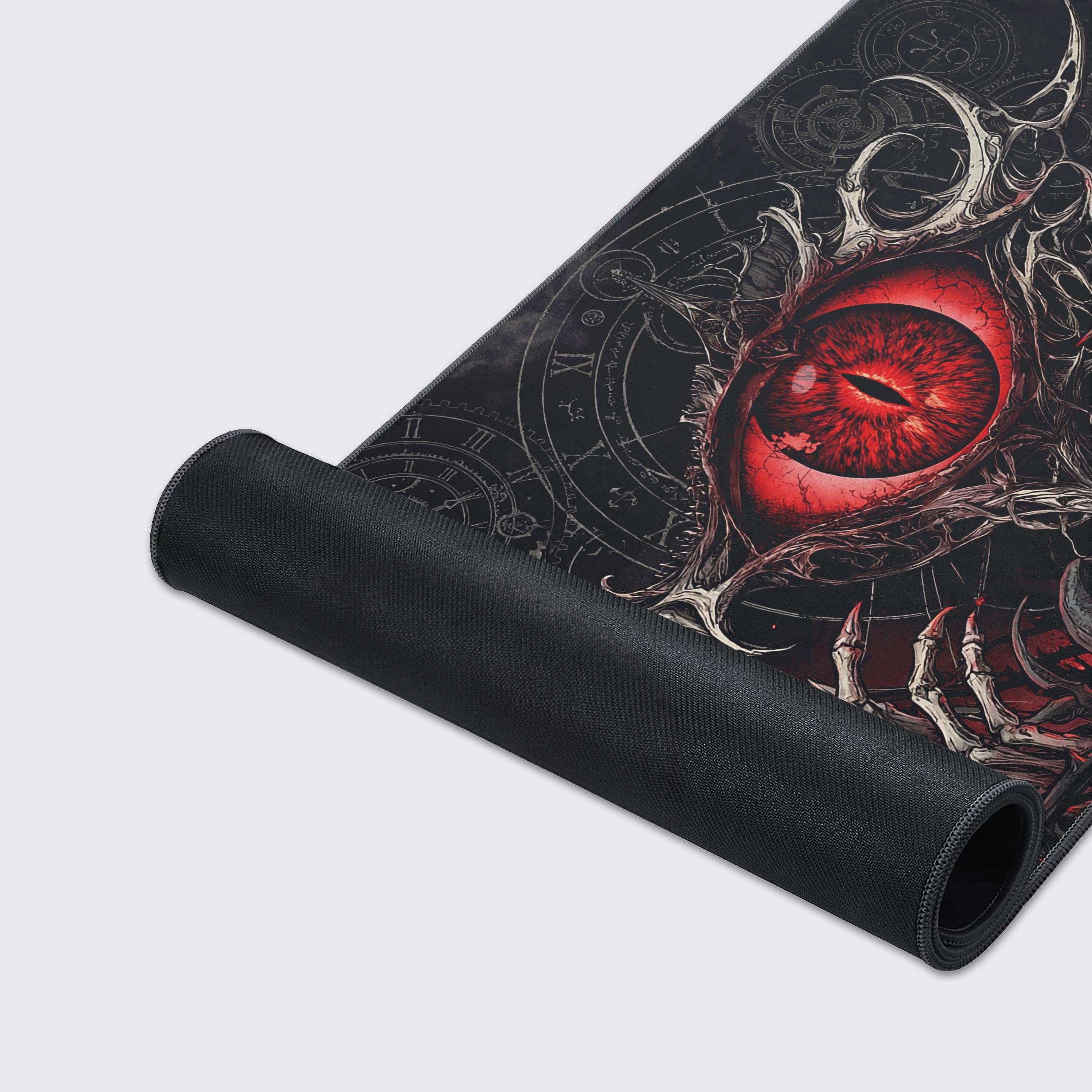 A close-up of the Eye of Judgment gaming desk mat's durable stitched edges and smooth fabric, showcasing the detailed crimson eye artwork. - Epic Design Pads & Mousepads
