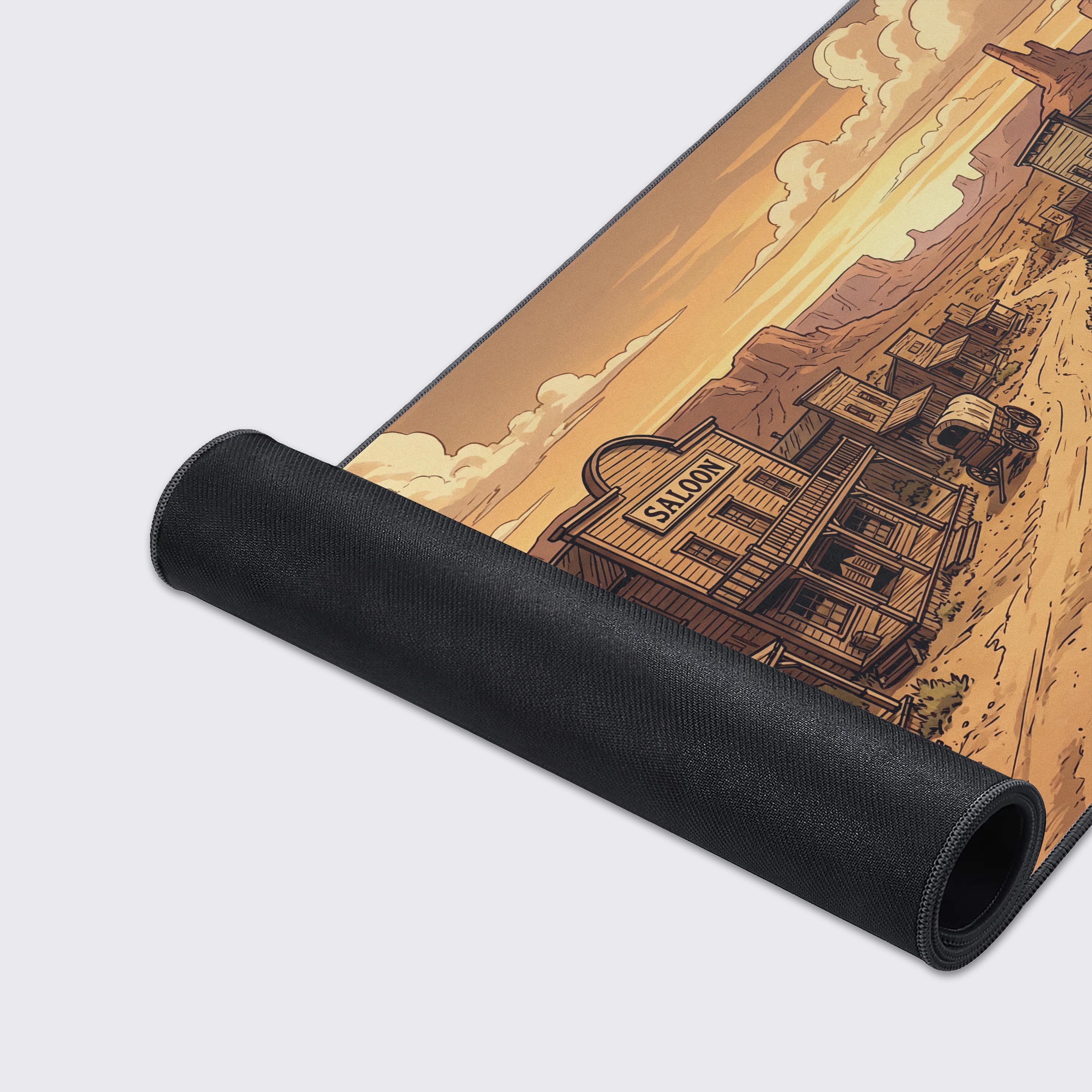 A close-up shot of the Canyon Town gaming desk mat highlighting the detailed artwork of a frontier town and the quality anti-fray stitched edges. - Epic Design Pads & Mousepads