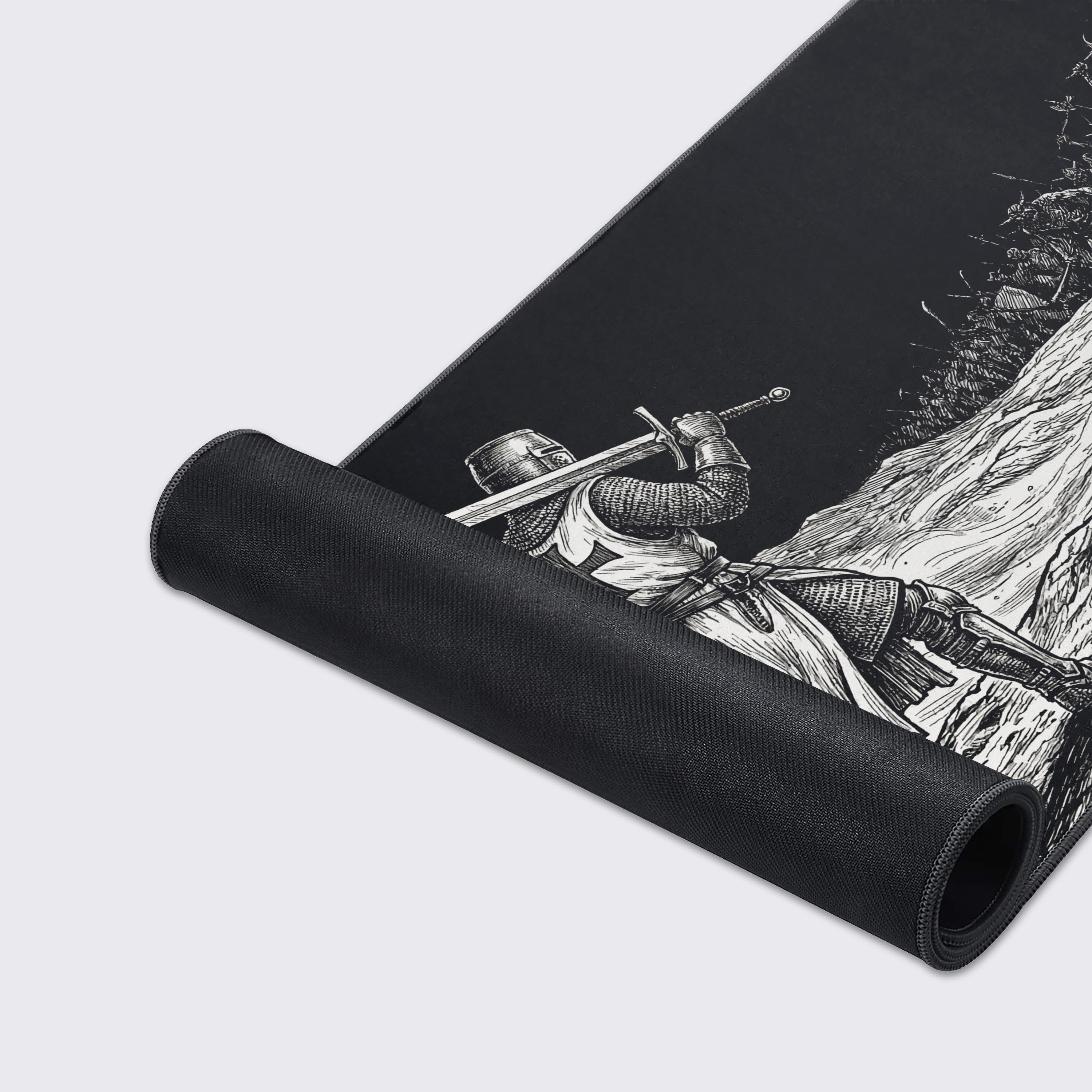 A close-up of the durable stitched edges and smooth fabric texture of 'The Last Stand' mouse pad, highlighting the detailed black and white knight illustration. - Epic Design Pads & Mousepads