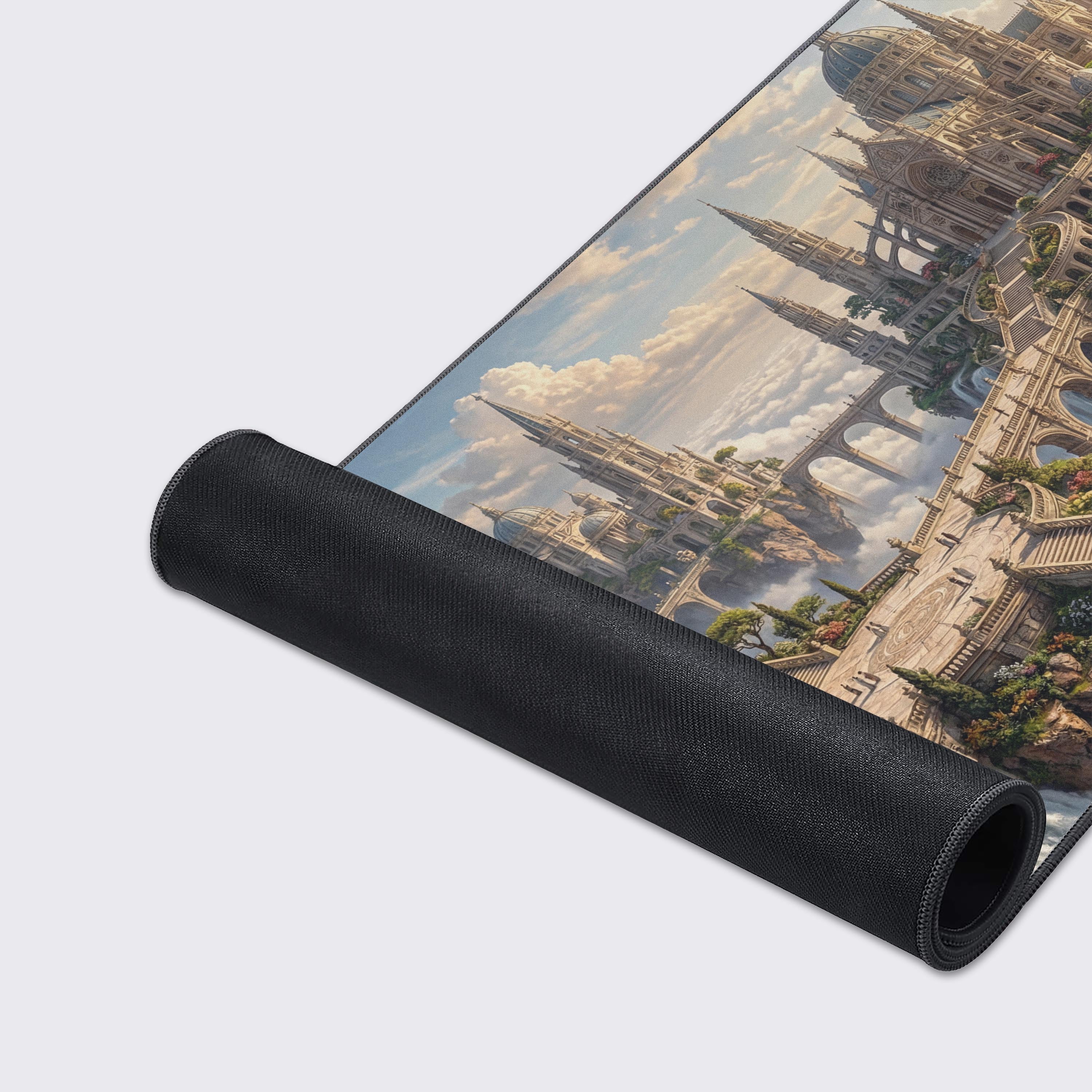 A close-up of the Sovereign Sky City gaming desk mat, highlighting its premium stitched edges and smooth, detailed fabric texture depicting a heavenly city. - Epic Design Pads & Mousepads