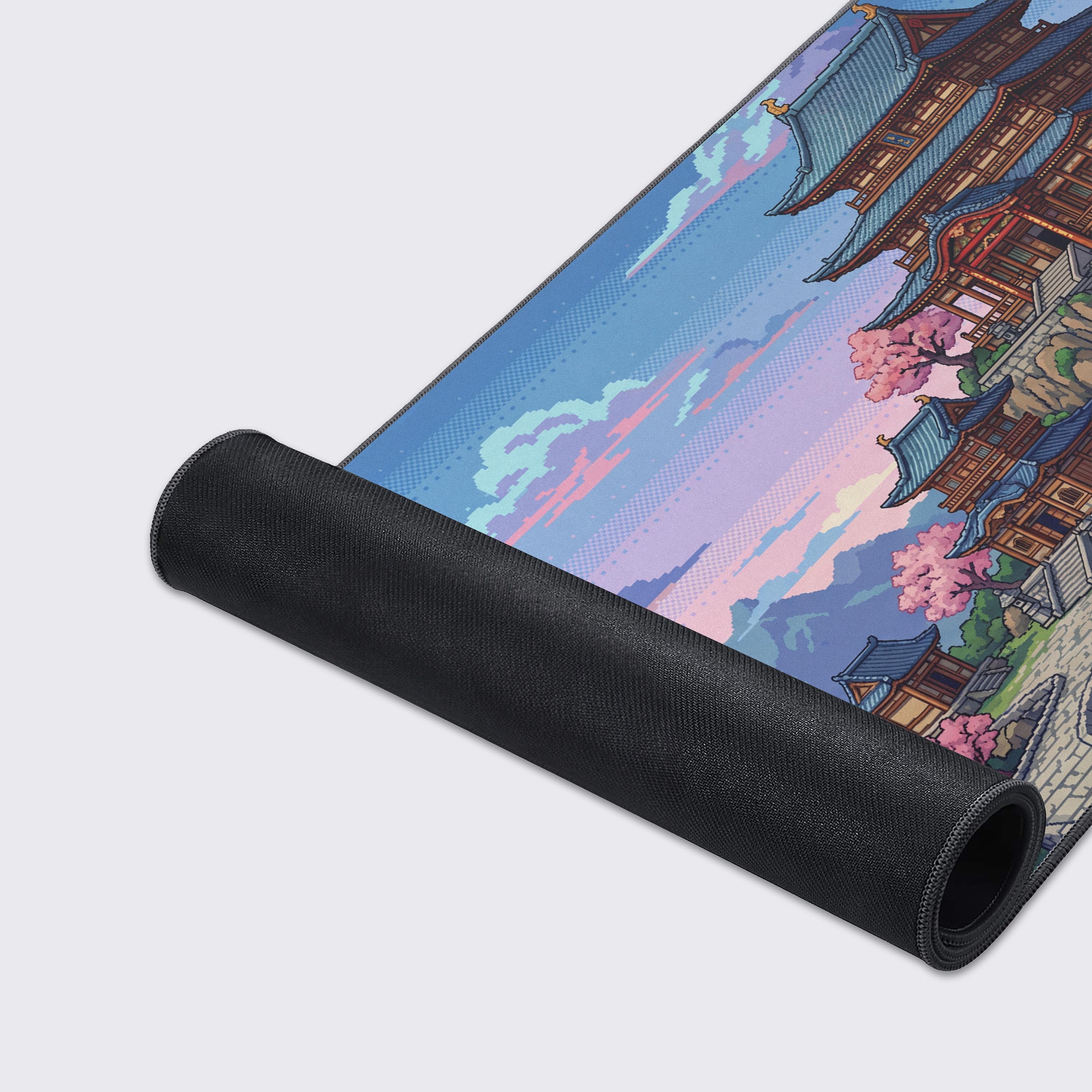 Close-up on the vibrant pixel art and durable stitched edges of the Pixel Pagoda Peak Mouse Pad, highlighting its high-quality fabric texture for smooth mouse movement. - Epic Design Pads & Mousepads