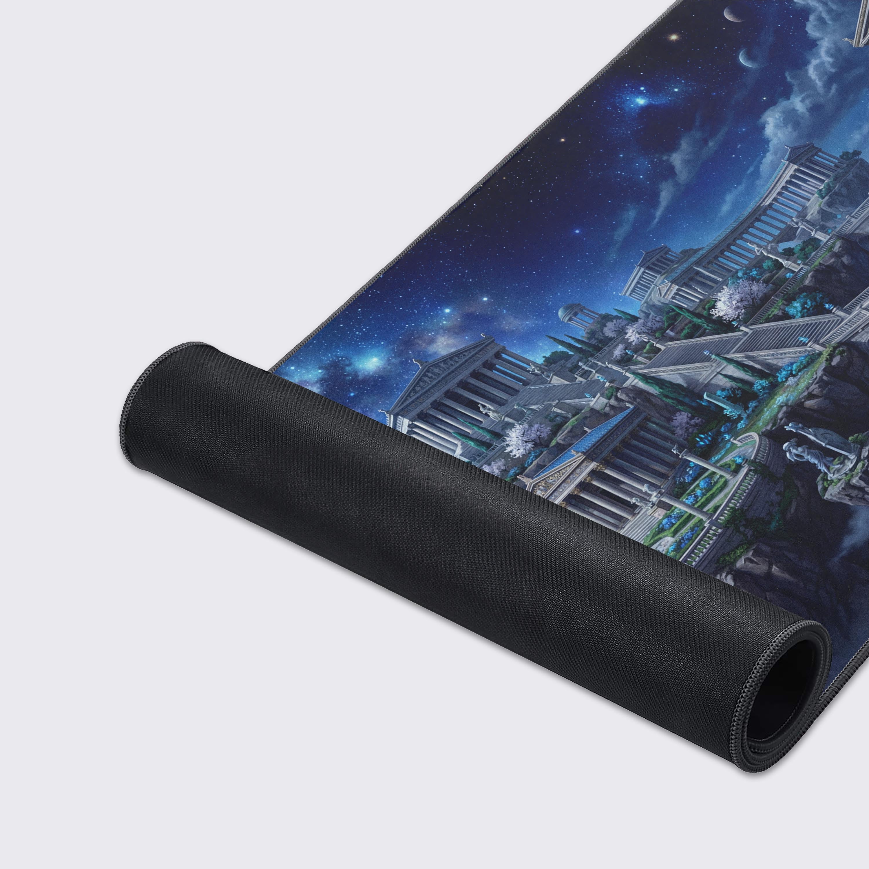 Close-up of the Astral Pantheon mouse pad's smooth surface and stitched edges, showcasing the detailed artwork of floating marble temples amidst clouds and stars. - Epic Design Pads & Mousepads
