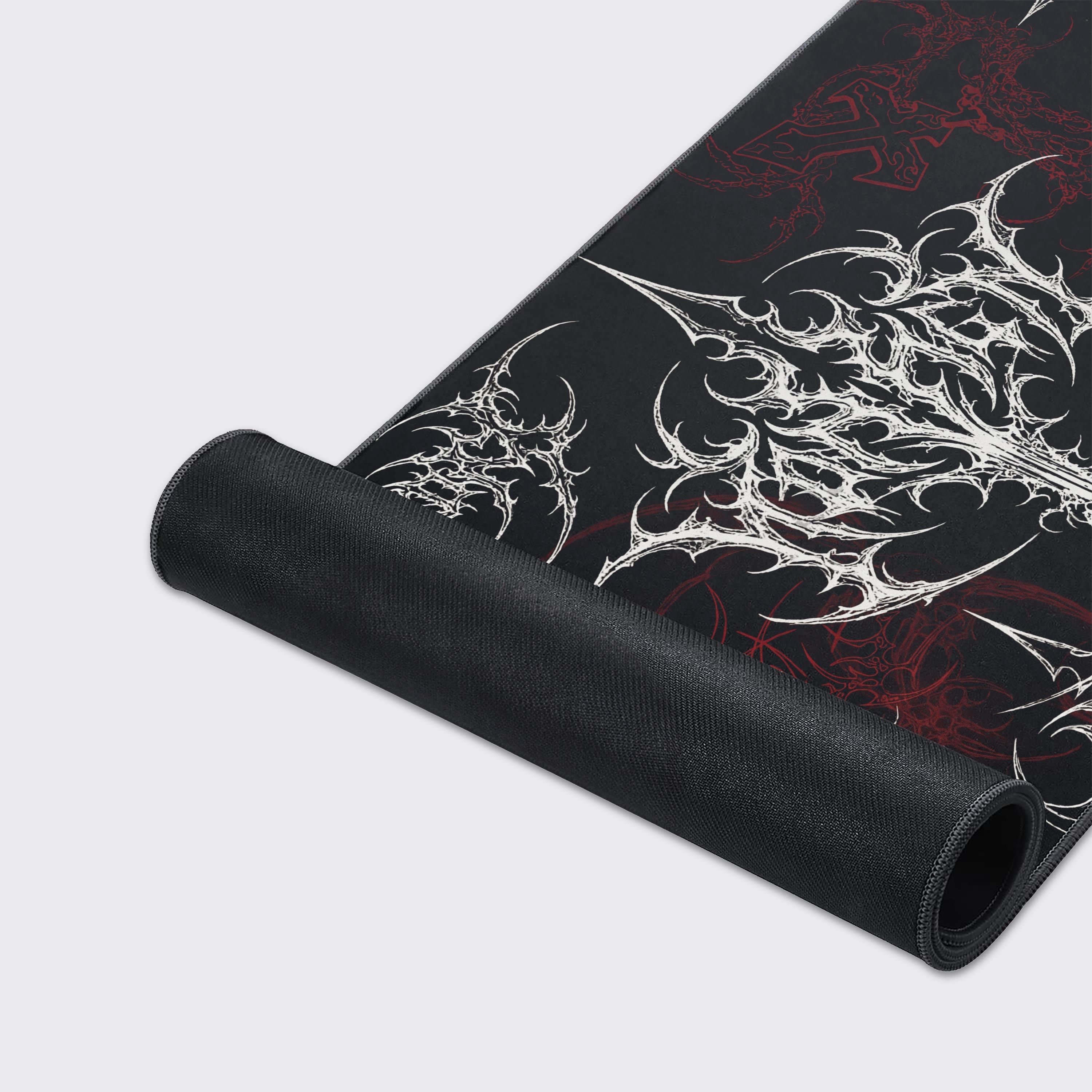 Close-up of the Fractured Lineage gaming desk mat, showing the high-quality fabric texture, stitched edges, and sharp, abstract white line art. - Epic Design Pads & Mousepads