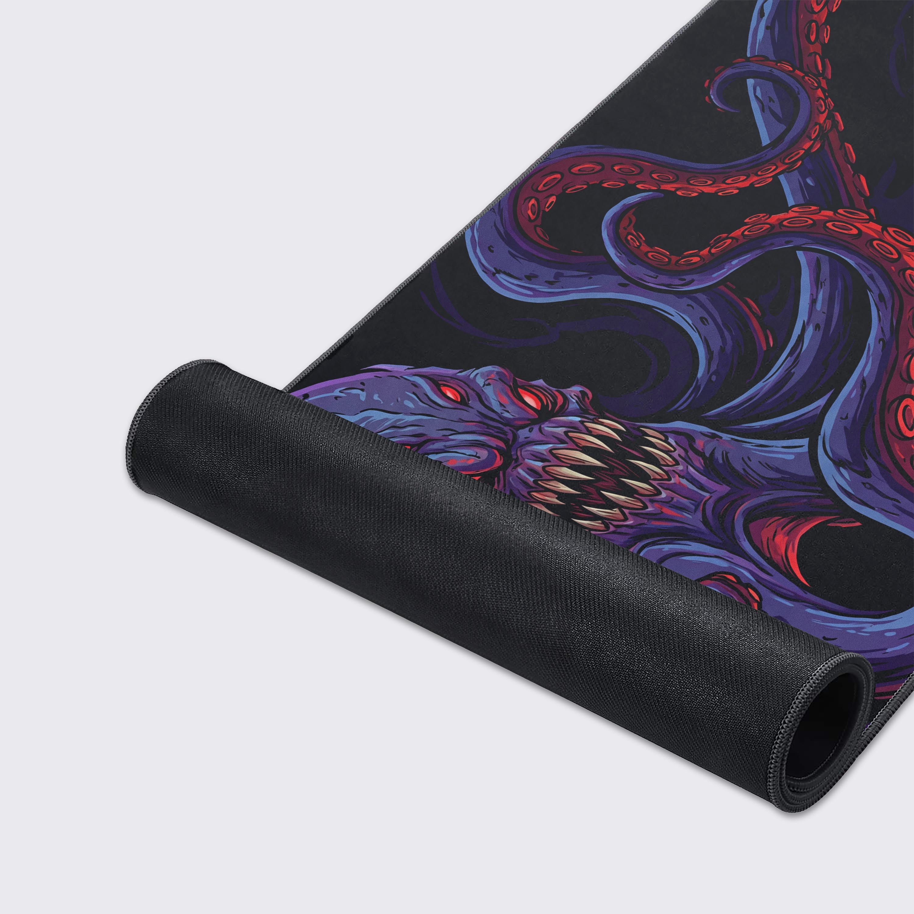 Close-up of the Deep Terror gaming desk mat, highlighting the detailed purple tentacle artwork, smooth fabric texture, and durable stitched edges for long-lasting use. - Epic Design Pads & Mousepads