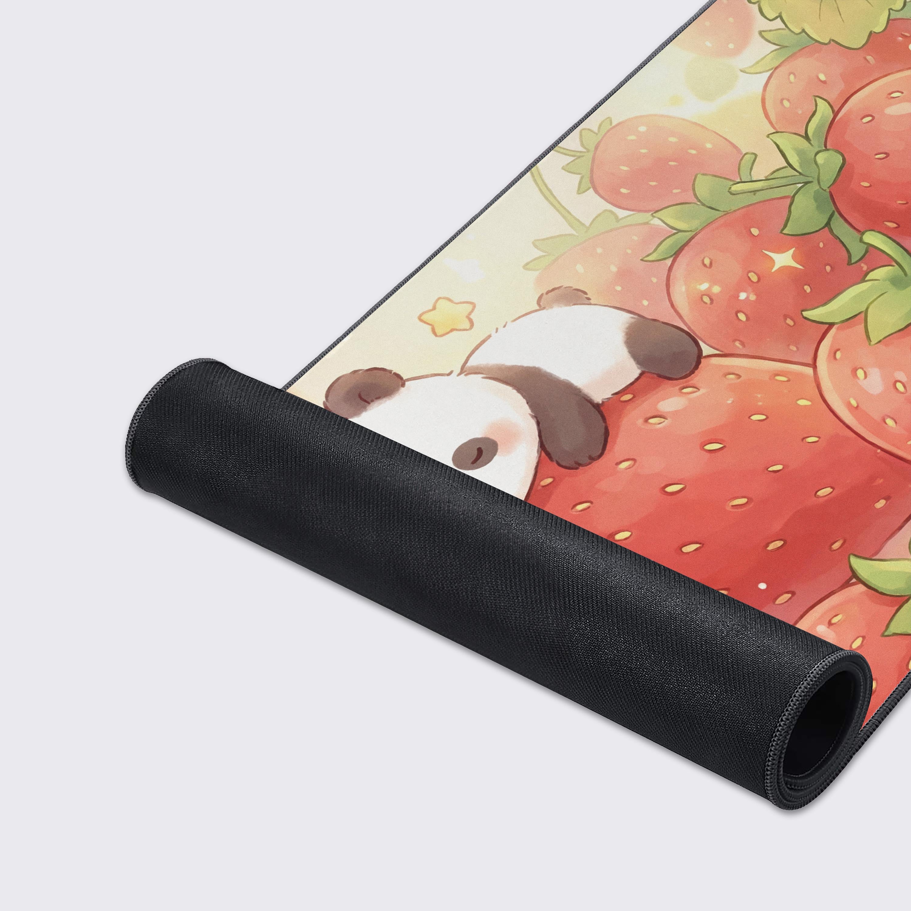 A close-up of the Strawberry Dreamland gaming desk mat highlighting the vibrant print, smooth fabric texture, and durable stitched edges for optimal mouse performance. - Epic Design Pads & Mousepads
