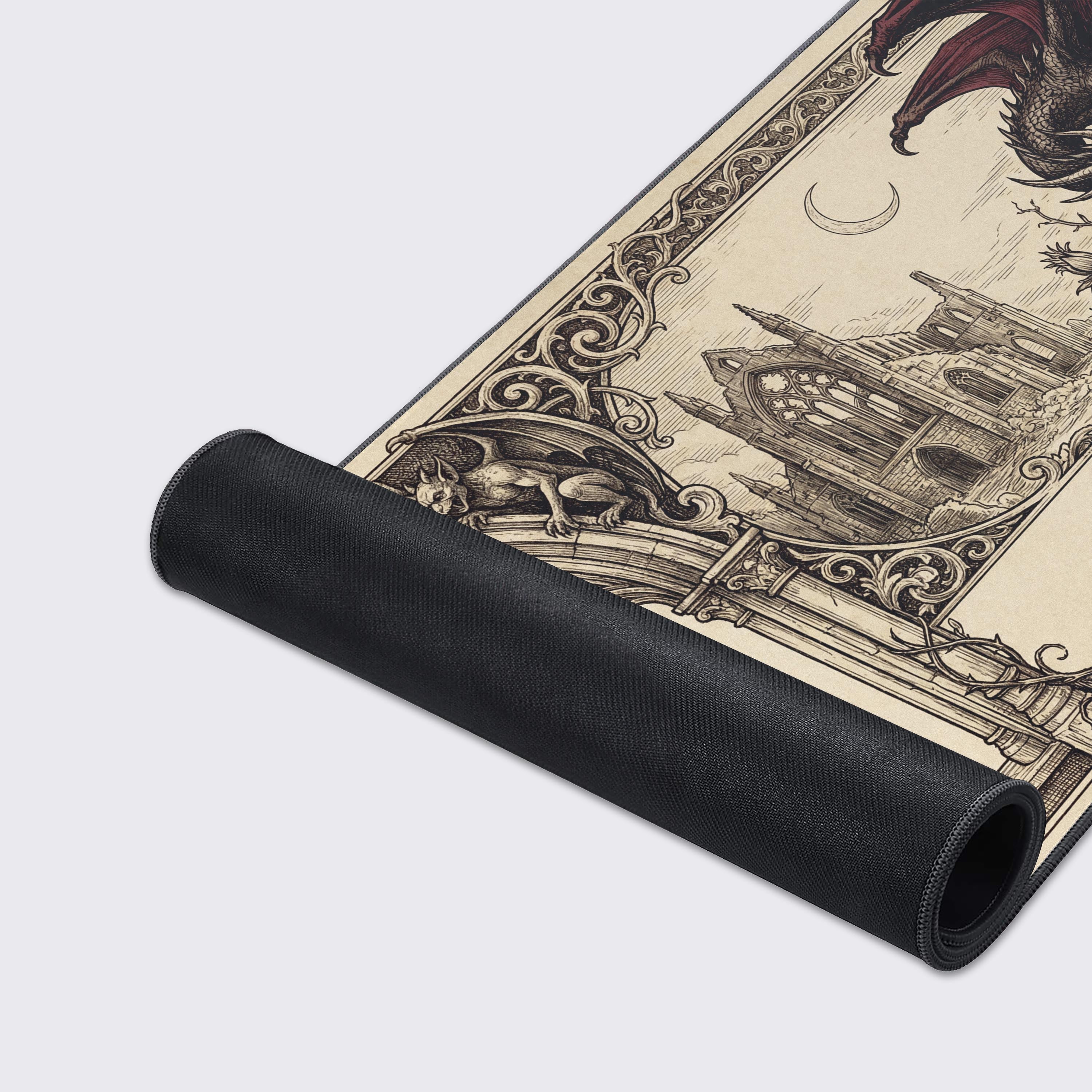 A close-up of the Gothic Remnant Gaming Desk Mat's smooth surface and stitched edges, highlighting the intricate vintage etching of the dragon and skull artwork. - Epic Design Pads & Mousepads