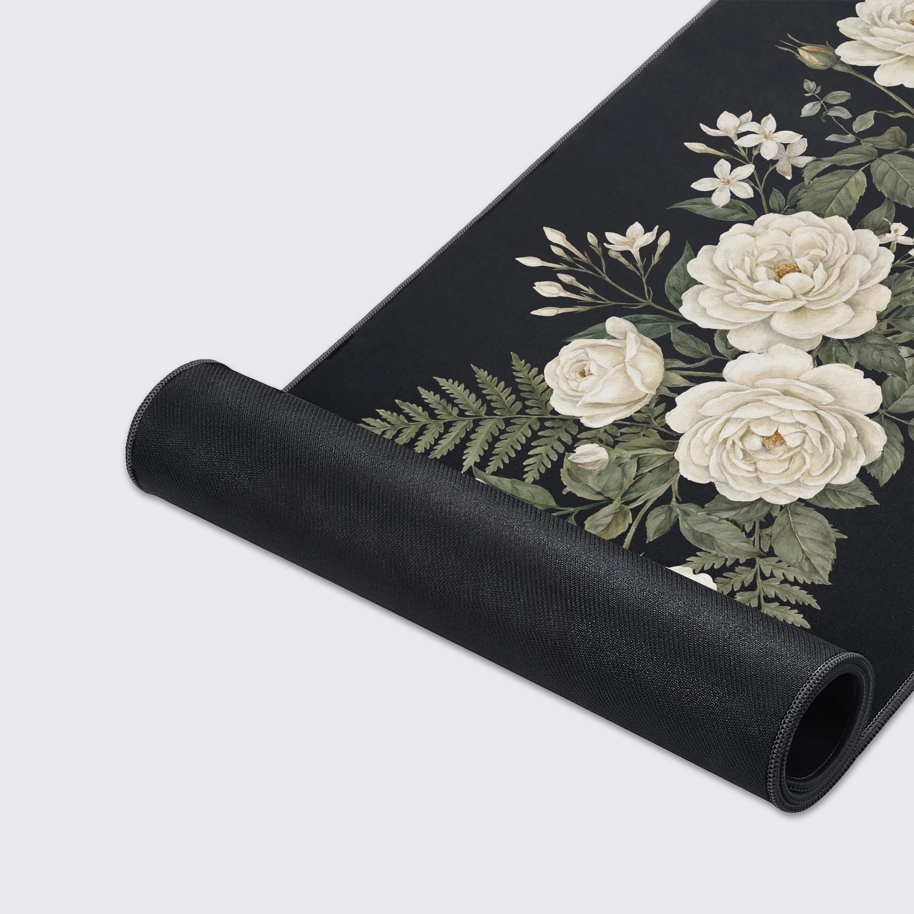Close-up shot of the Obsidian Bloom gaming desk mat highlighting the detailed botanical art, smooth fabric texture, and durable stitched edges for long-lasting use. - Epic Design Pads & Mousepads