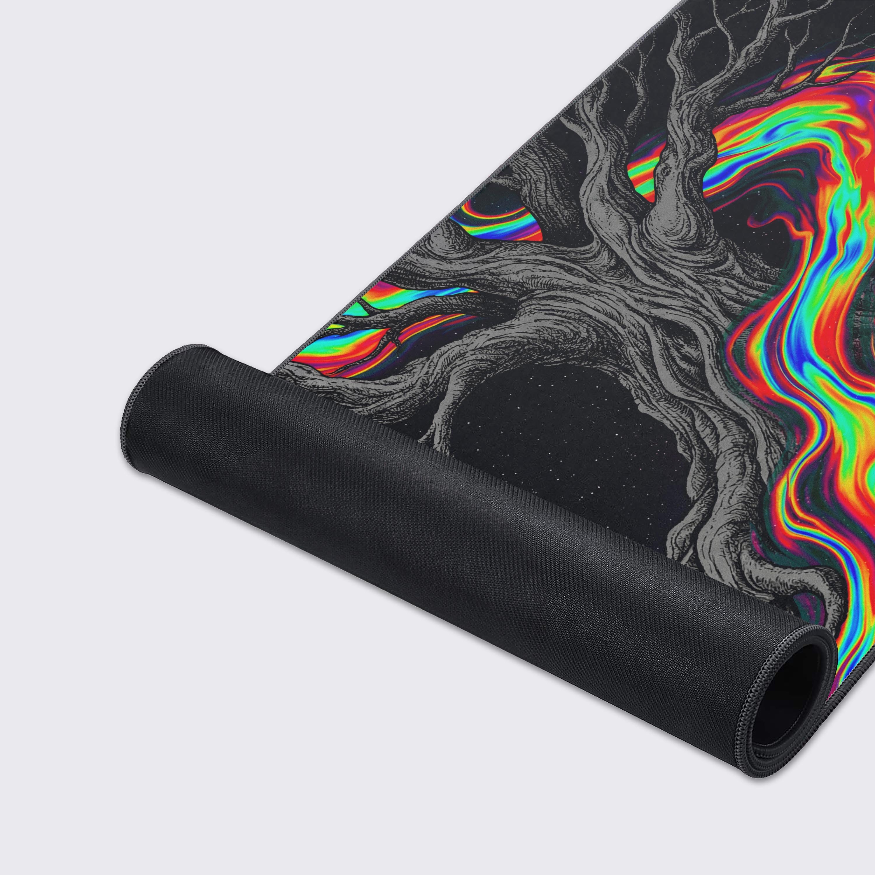 Close-up of the Cosmic Roots mouse pad's smooth fabric texture and durable stitched edges, highlighting the vibrant river flowing through the monochrome tree design. - Epic Design Pads & Mousepads