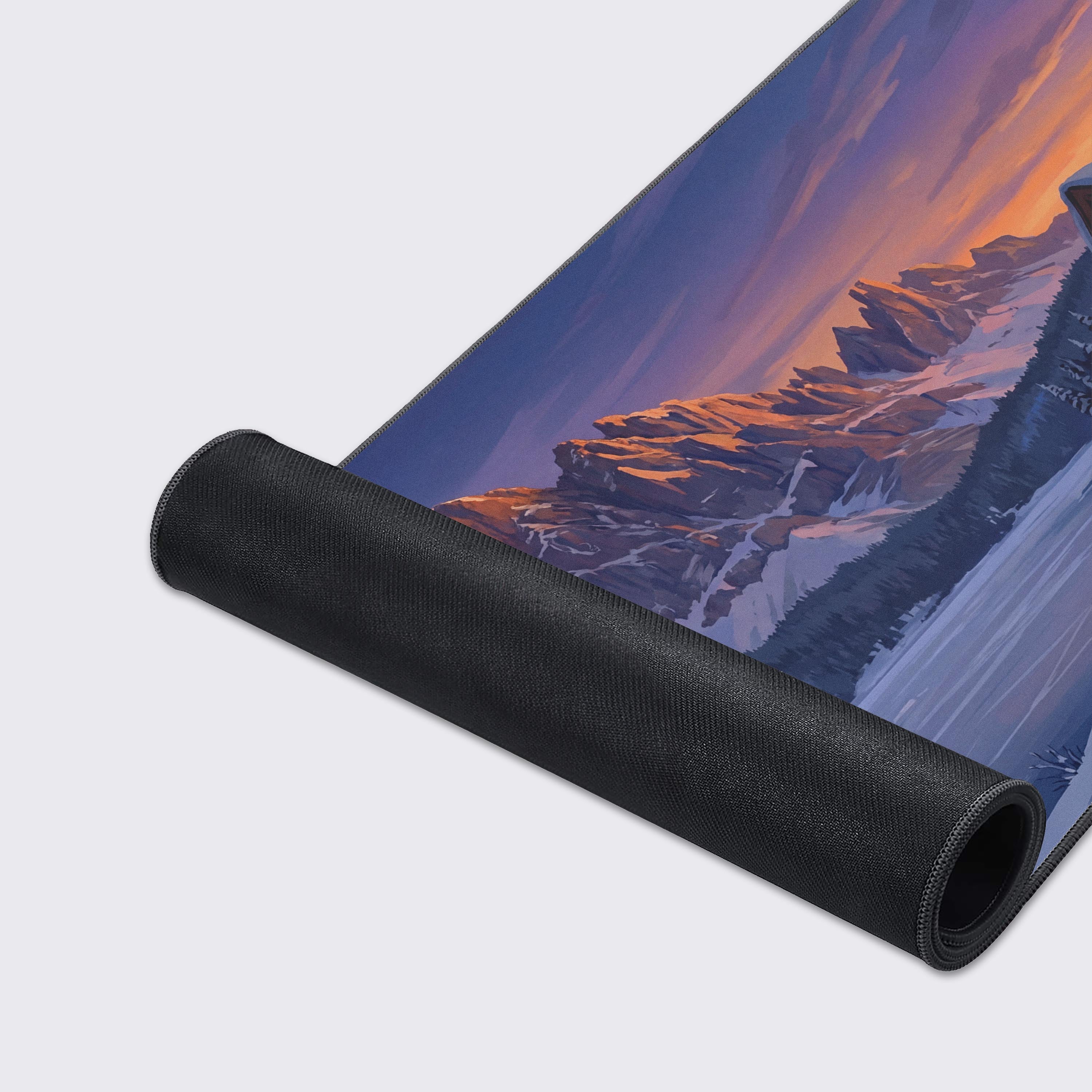 Close-up of the Cabin Retreat gaming desk mat showcasing the high-quality fabric texture and durable stitched edges of the winter scene. - Epic Design Pads & Mousepads