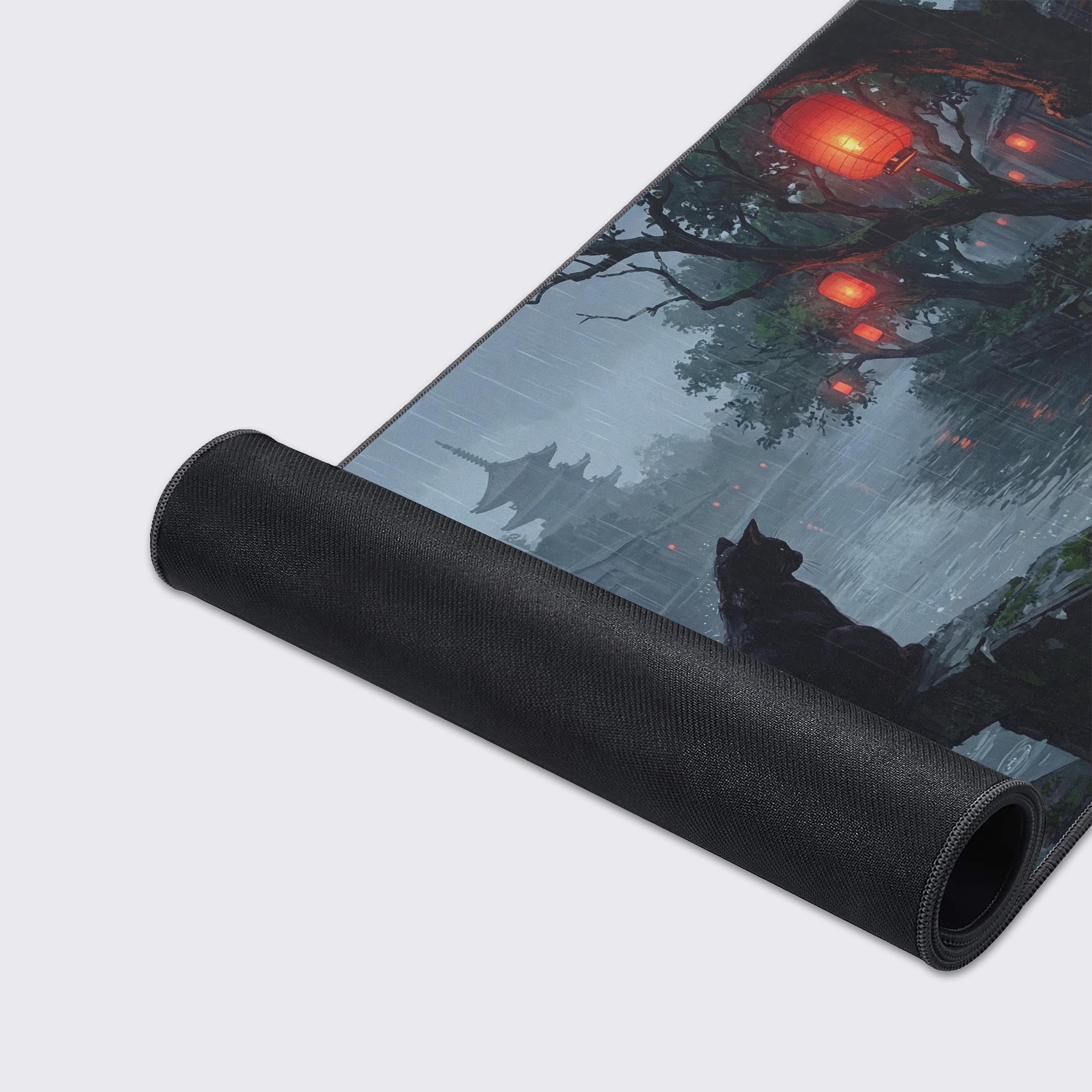 Close-up of the Rainy Watcher gaming desk mat, highlighting the smooth fabric texture and durable stitched edges, with the black cat and red lantern artwork visible. - Epic Design Pads & Mousepads