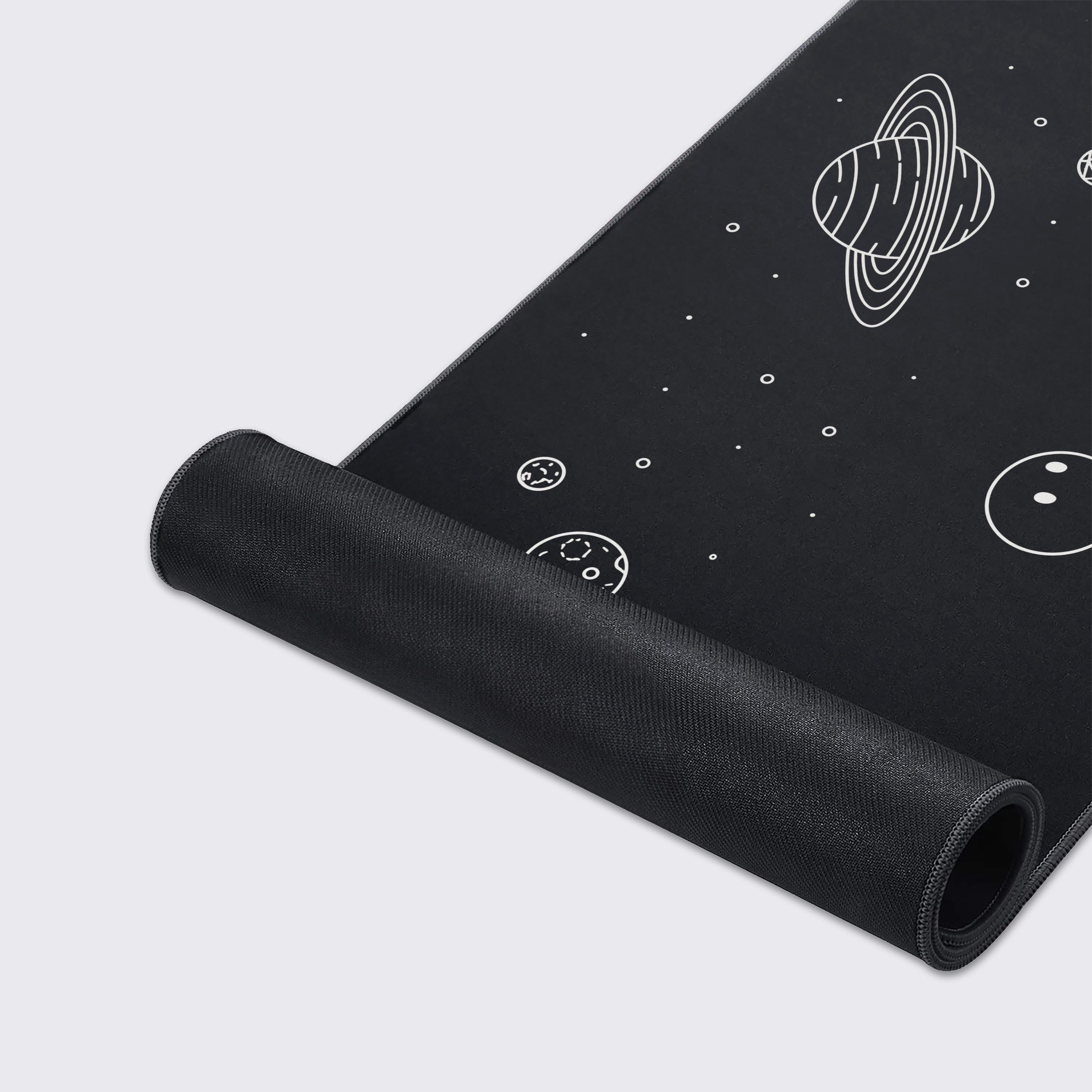 A close-up of the Void Watcher mouse pad's high-quality fabric texture and durable stitched edges. The clean, white line art of the cosmic design offers a smooth surface for precise mouse control. - Epic Design Pads & Mousepads