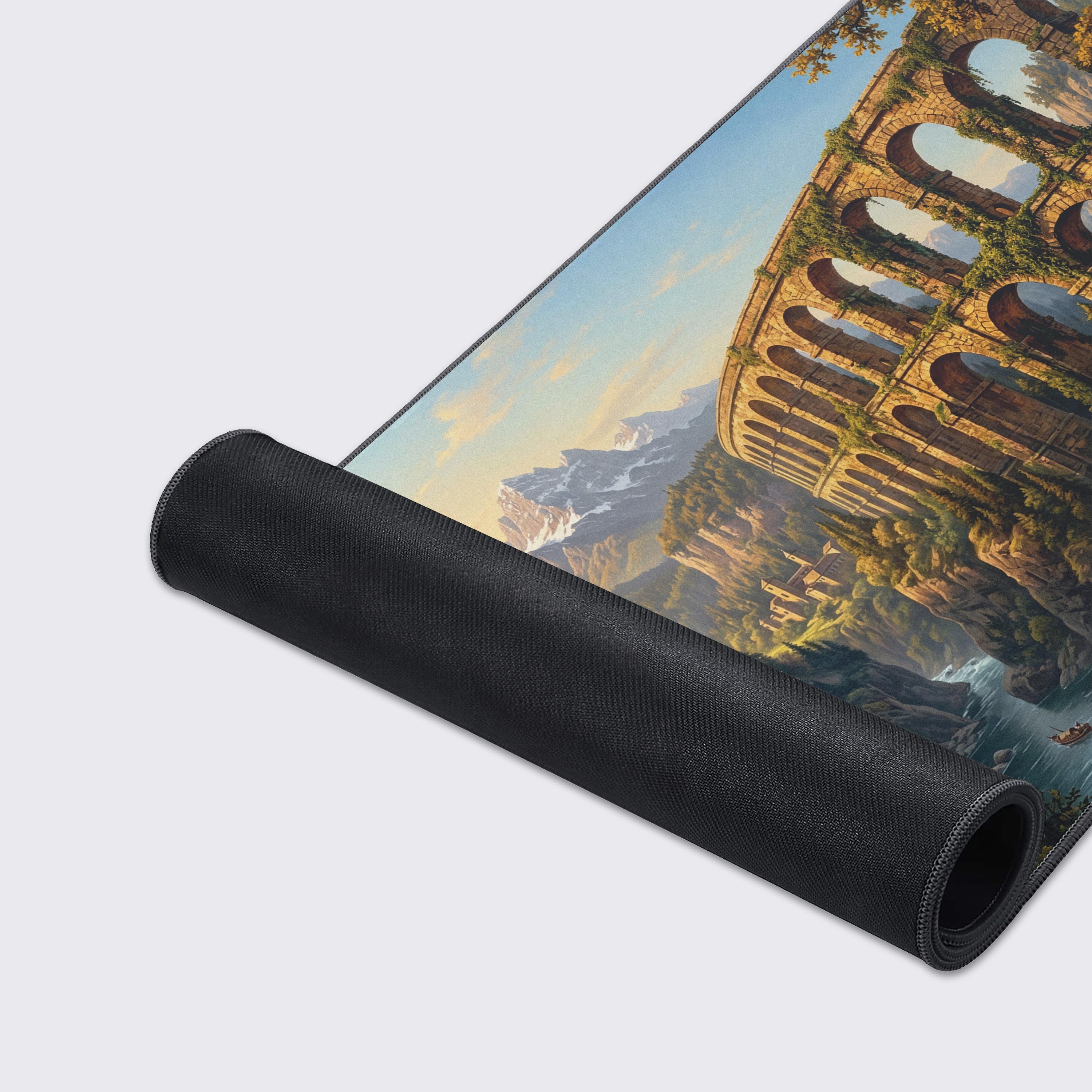 Close-up of the Ancient Aqueduct gaming desk mat, highlighting the detailed landscape artwork and durable anti-fray stitched edges. - Epic Design Pads & Mousepads