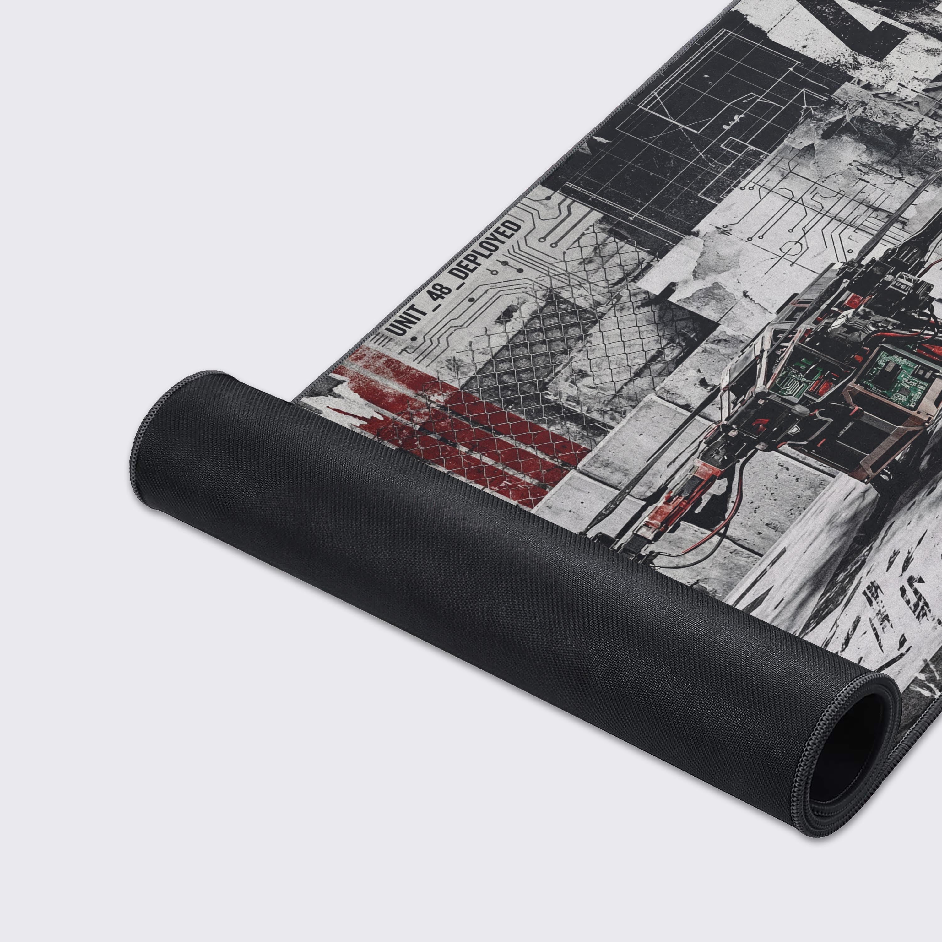 A close-up of the Kinetic Foundry gaming desk mat showcasing the high-detail drone artwork and durable stitched edges on the smooth fabric surface. - Epic Design Pads & Mousepads