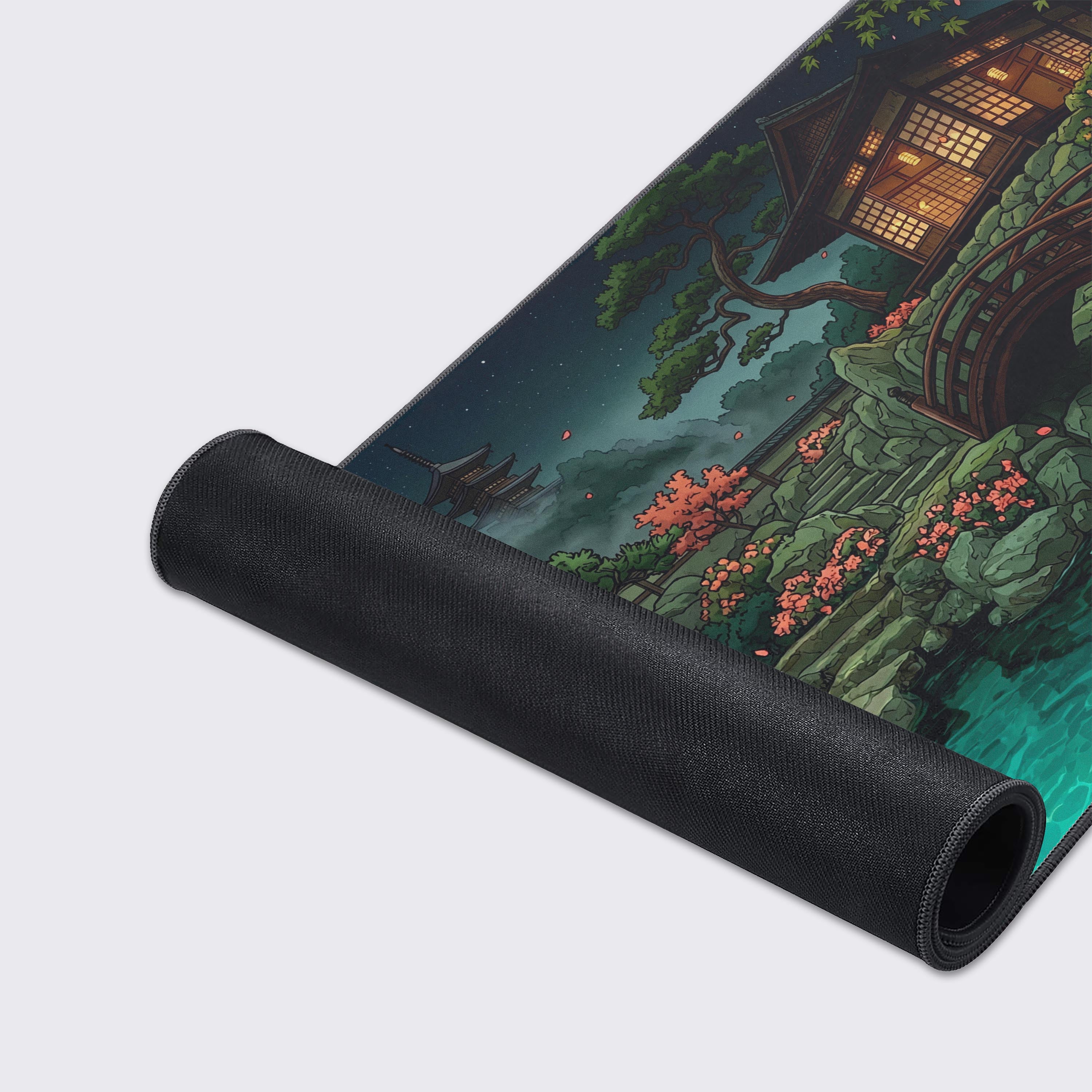 A close-up of the Midnight Tea House mouse pad's high-quality fabric and stitched edges, highlighting the detailed artwork of the koi pond. - Epic Design Pads & Mousepads