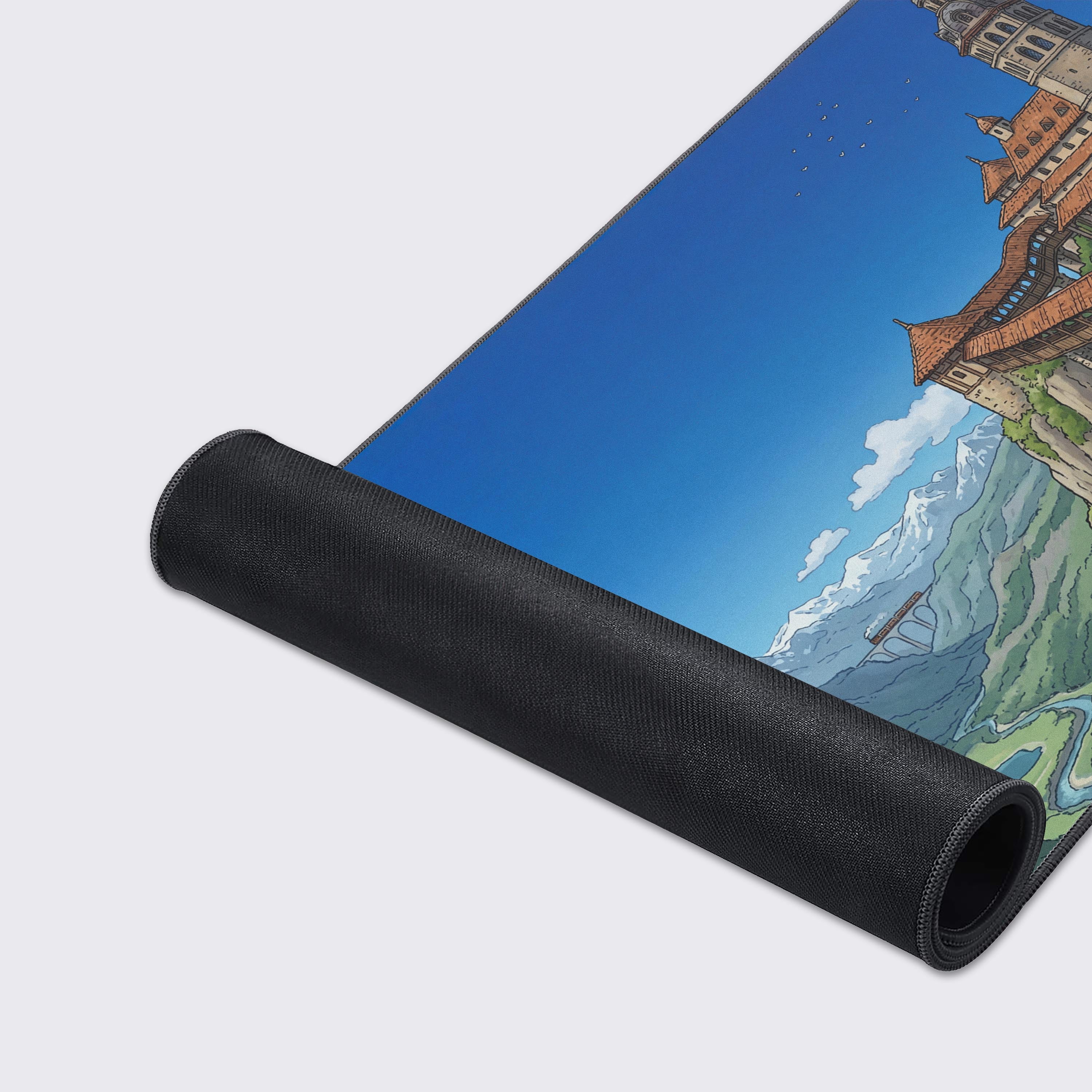 Close-up of the Highland Escape Gaming Desk Mat highlighting the premium stitched edges and smooth fabric texture of the vibrant mountain scenery artwork. - Epic Design Pads & Mousepads