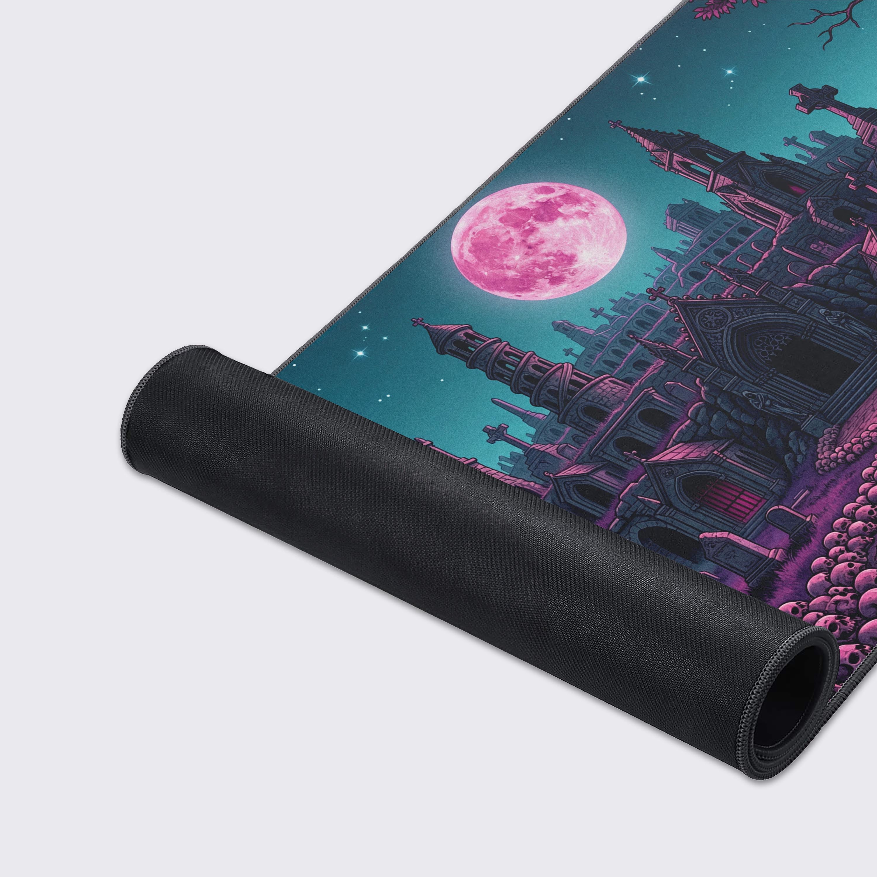A close-up of the Lunar Boneyard mouse pad's high-quality fabric texture and stitched edges, highlighting the vibrant pink and purple graveyard artwork. - Epic Design Pads & Mousepads