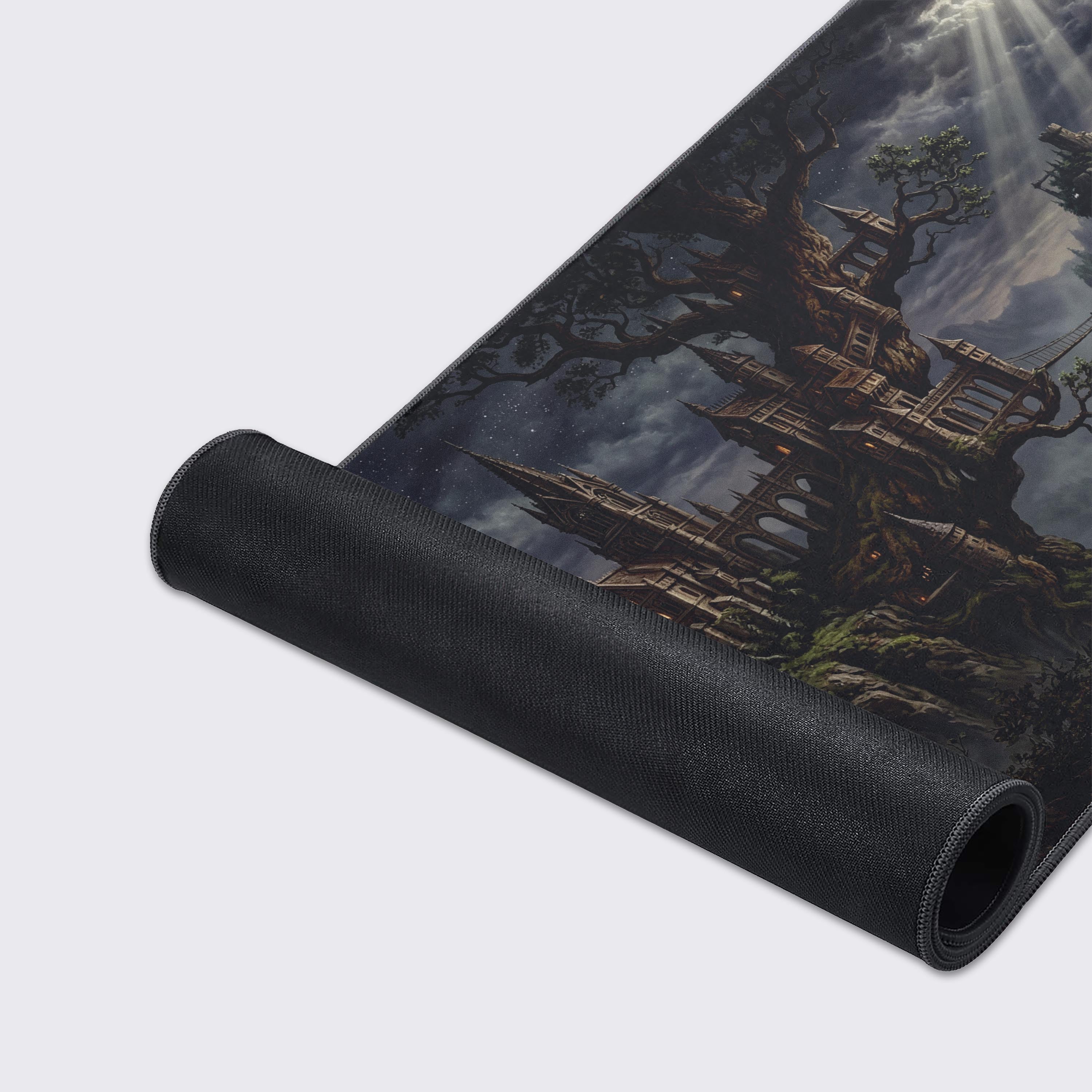Close-up of the Roots of Ruin gaming desk mat highlighting the high-quality fabric texture and durable stitched edges of the epic castle artwork. - Epic Design Pads & Mousepads