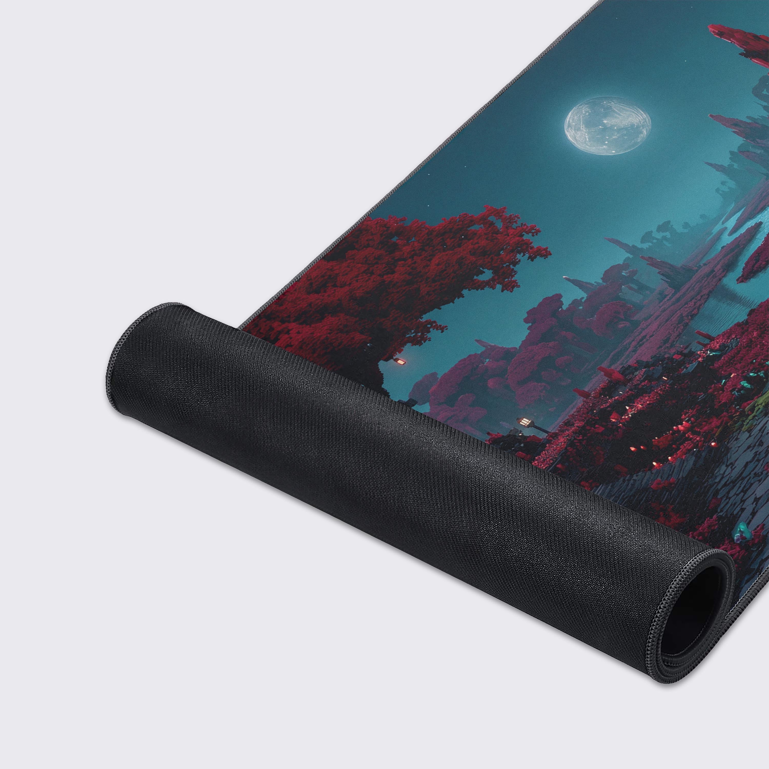 A close-up of the Voxel Valley gaming desk mat showcasing the high-detail voxel art, smooth fabric texture, and durable stitched edges, with glowing crystals and a moon in the background. - Epic Design Pads & Mousepads