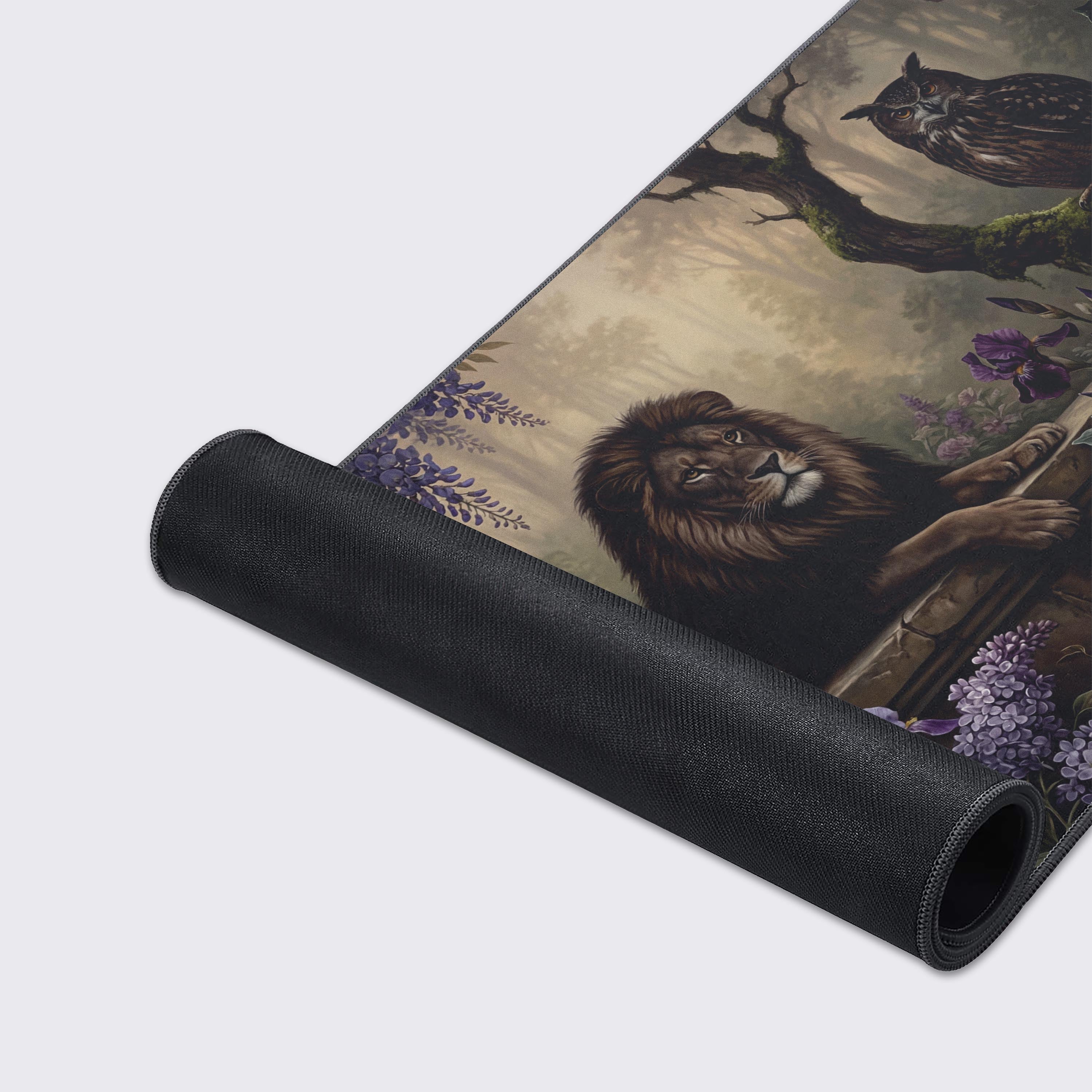 A close-up of the Mystic Wardens mouse pad highlights its premium fabric texture and durable stitched edges, with the detailed owl artwork clearly visible. - Epic Design Pads & Mousepads