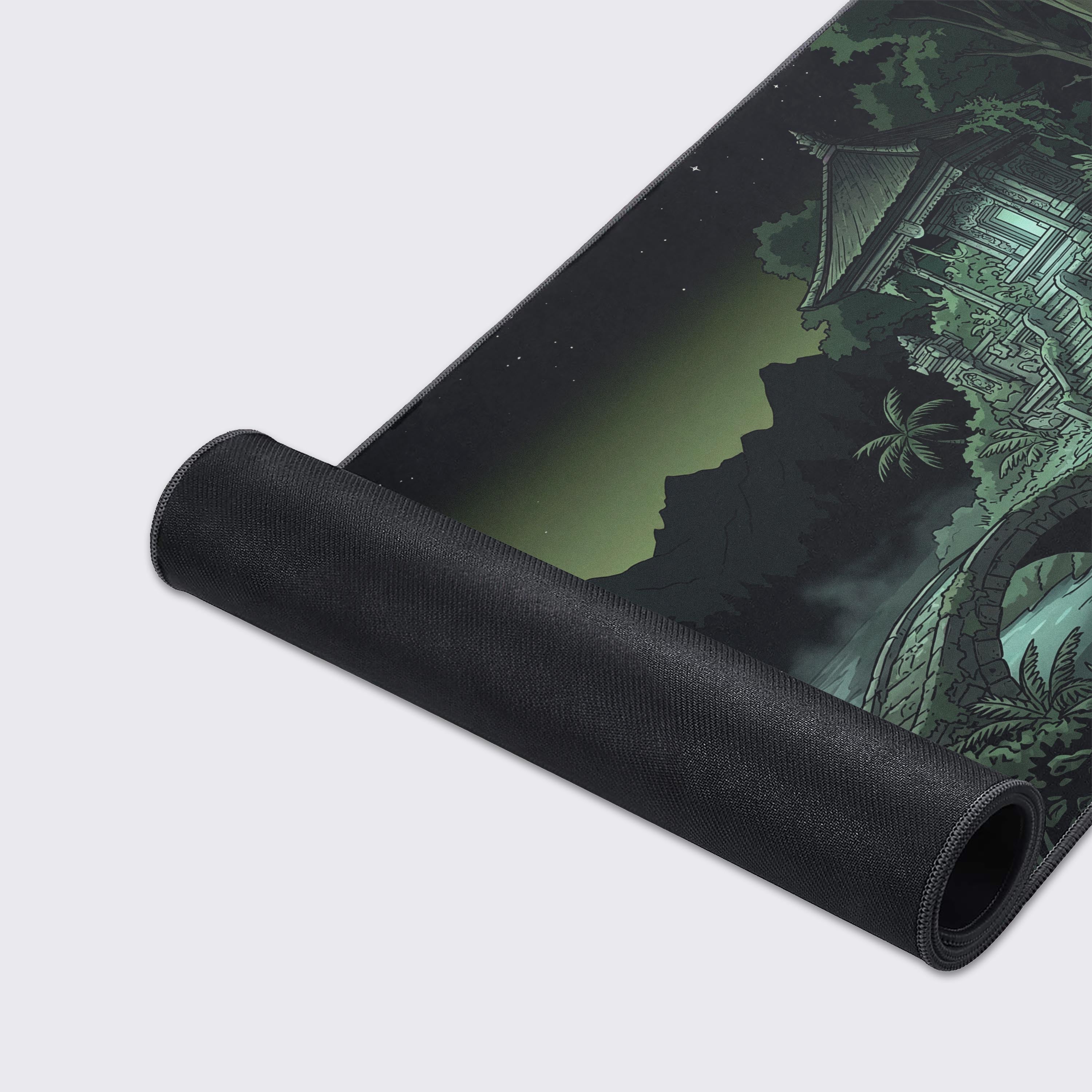 Close-up of the Forgotten Temple Gaming Desk Mat, highlighting the smooth fabric texture, stitched edges, and detailed illustration of the ancient shrine. - Epic Design Pads & Mousepads