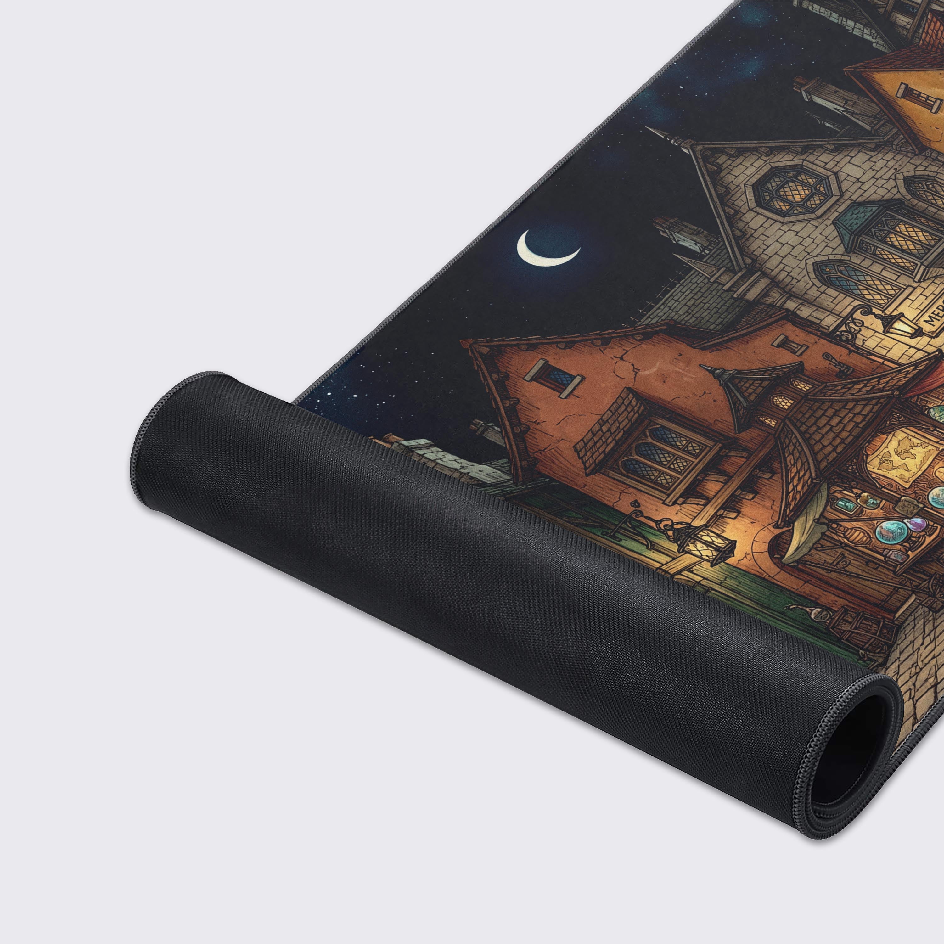 A close-up of the Merchant's Row gaming desk mat showcasing the high-quality stitched edges and smooth fabric surface with the detailed RPG town illustration. - Epic Design Pads & Mousepads