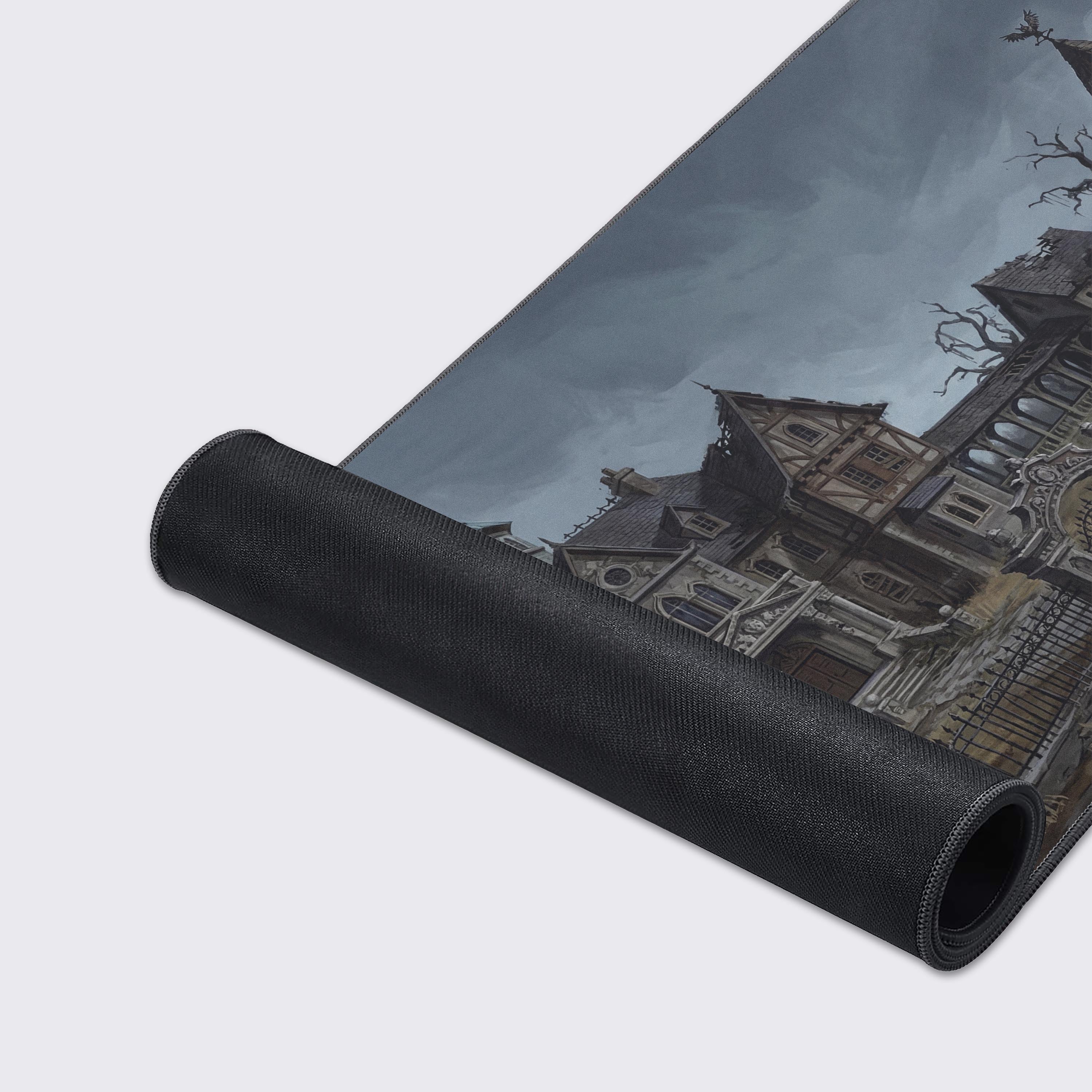 A close-up of the Haunted Grounds gaming desk mat, highlighting the detailed art of the gothic ruins and the quality stitched edges. - Epic Design Pads & Mousepads