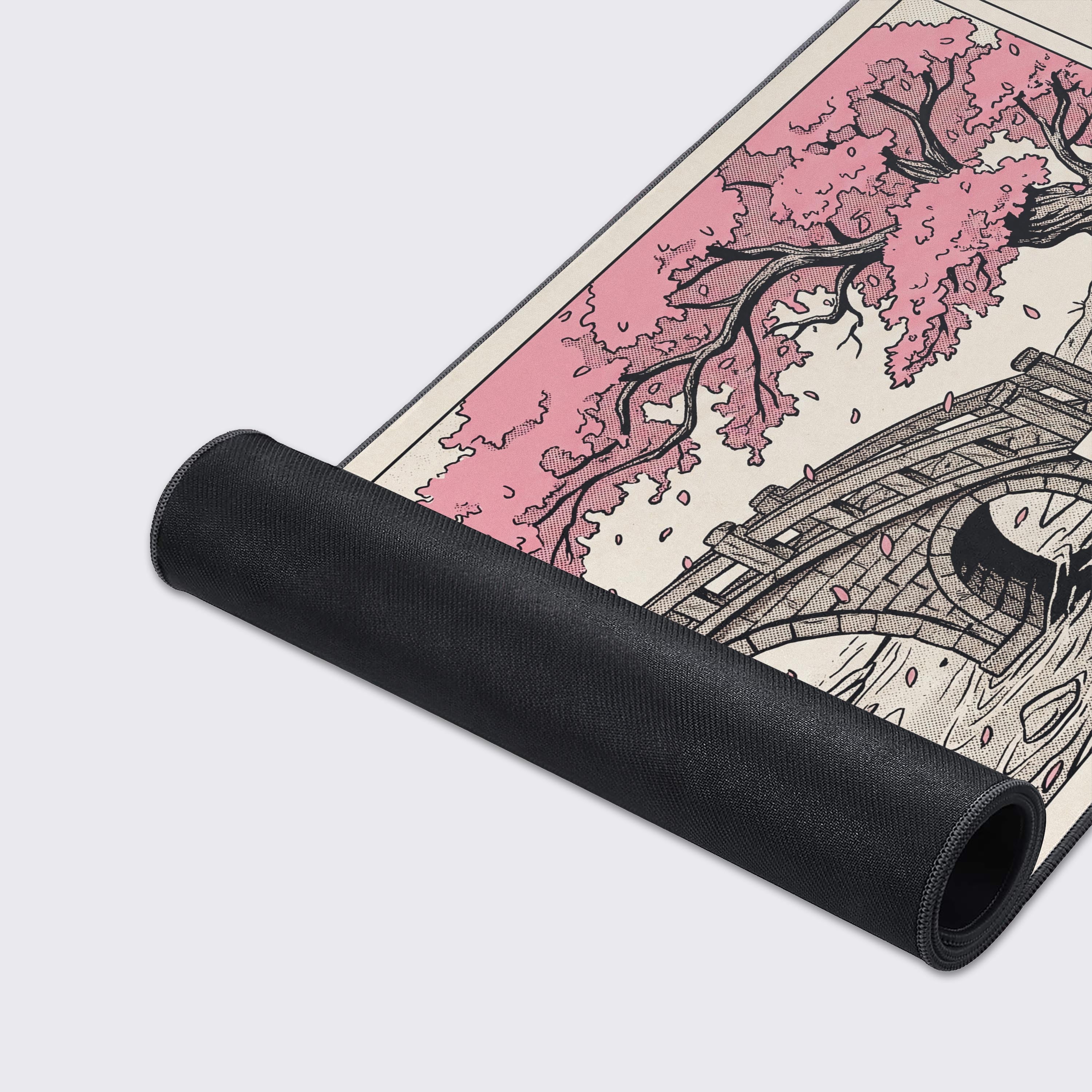 A close-up of the Sakura Comic Panels gaming desk mat, highlighting the durable stitched edges and smooth fabric texture of the cherry blossom manga art. - Epic Design Pads & Mousepads