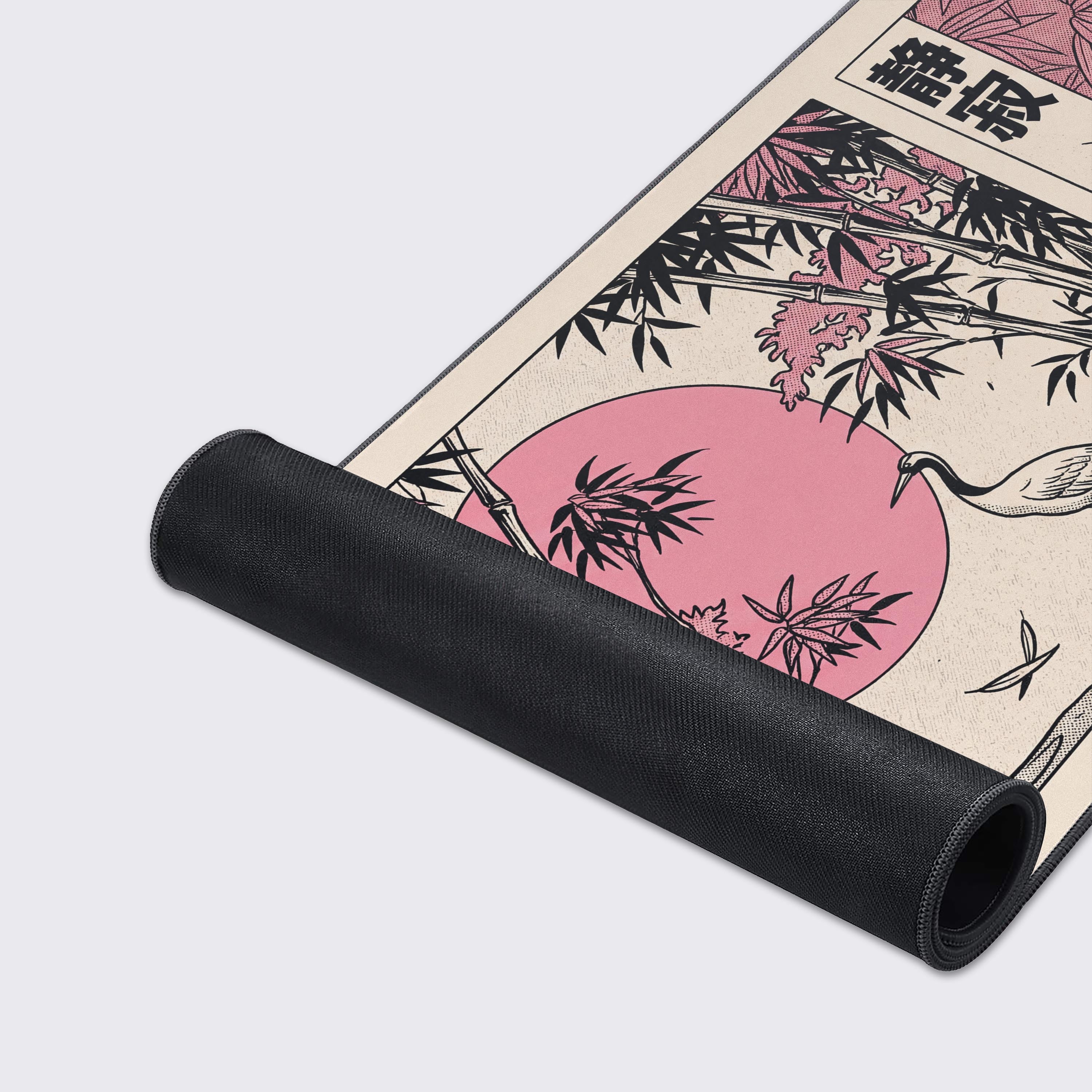 Close-up of the Night Panels gaming desk mat showing the smooth fabric texture, durable stitched edges, and detailed pink and black manga-style crane artwork. - Epic Design Pads & Mousepads