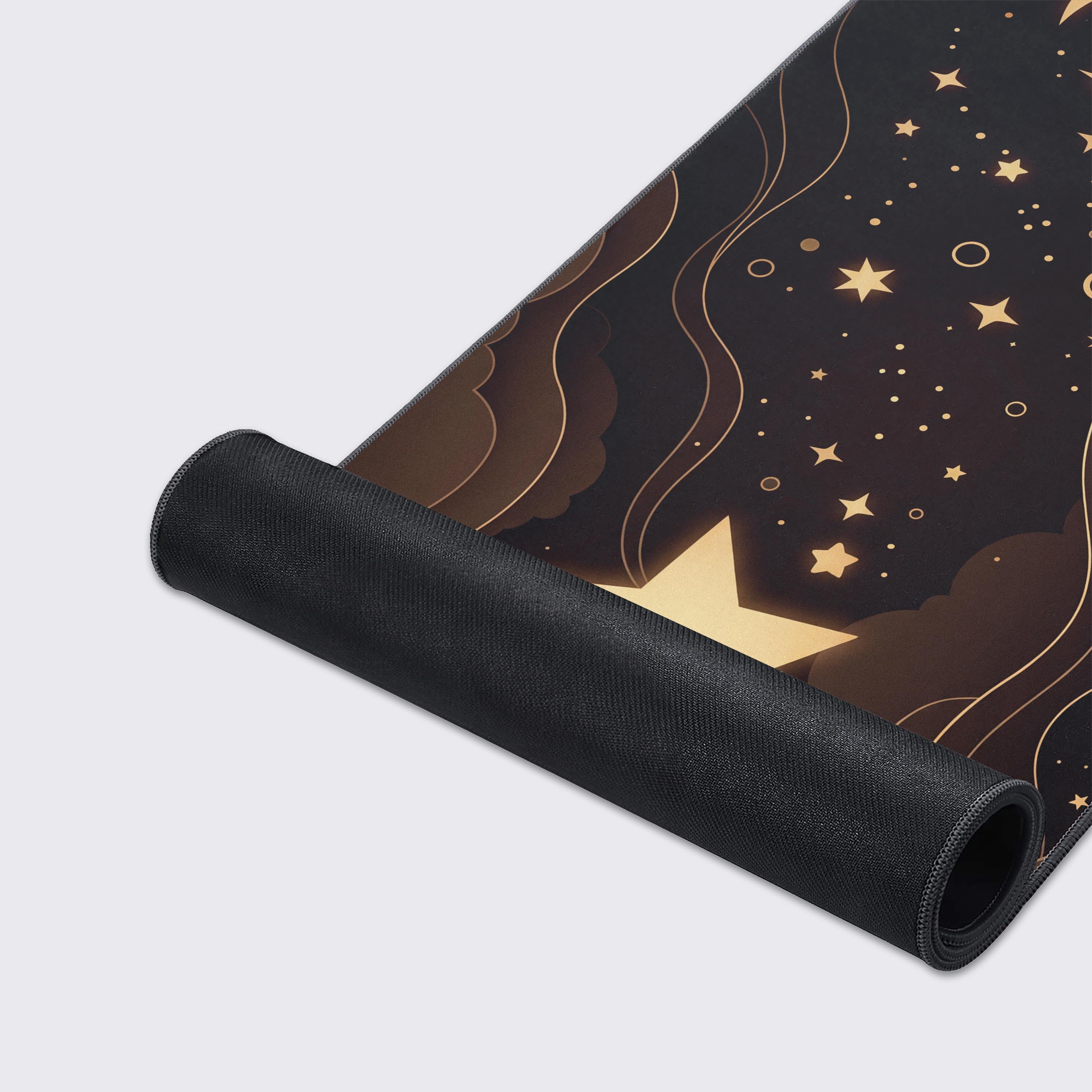 Close-up of the Celestial Layers gaming desk mat showcasing its smooth fabric texture, stitched edges, and detailed gold and brown moon artwork. - Epic Design Pads & Mousepads