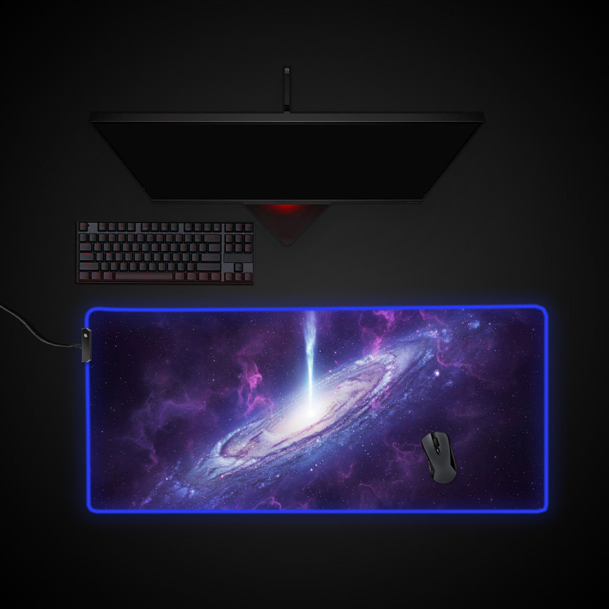 Cosmic Eruption desk mat with RGB edge lighting