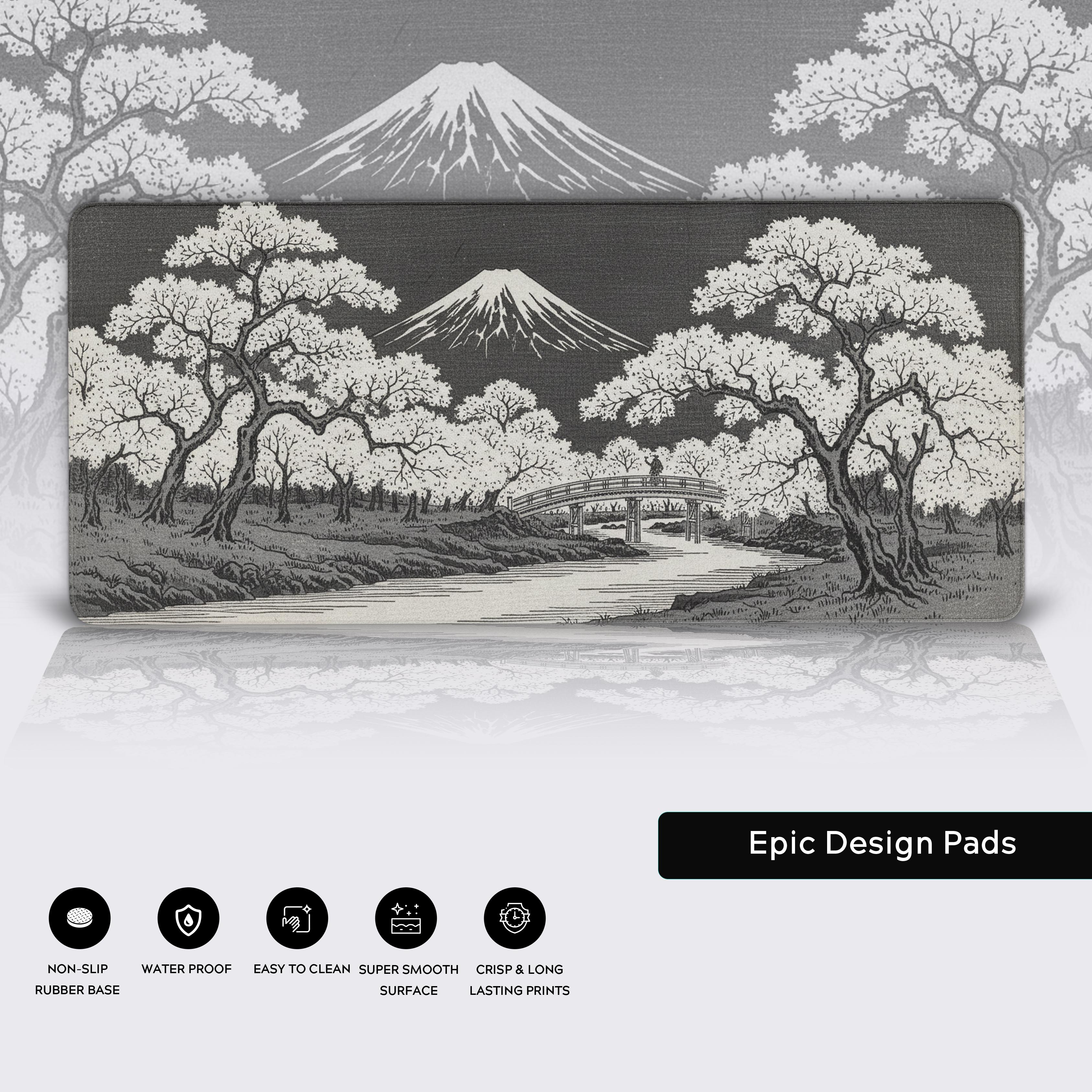 Close-up of the Sakura Bridge Japanese desk mat highlighting the durable stitched edges, waterproof surface, and non-slip rubber base. - Epic Design Pads