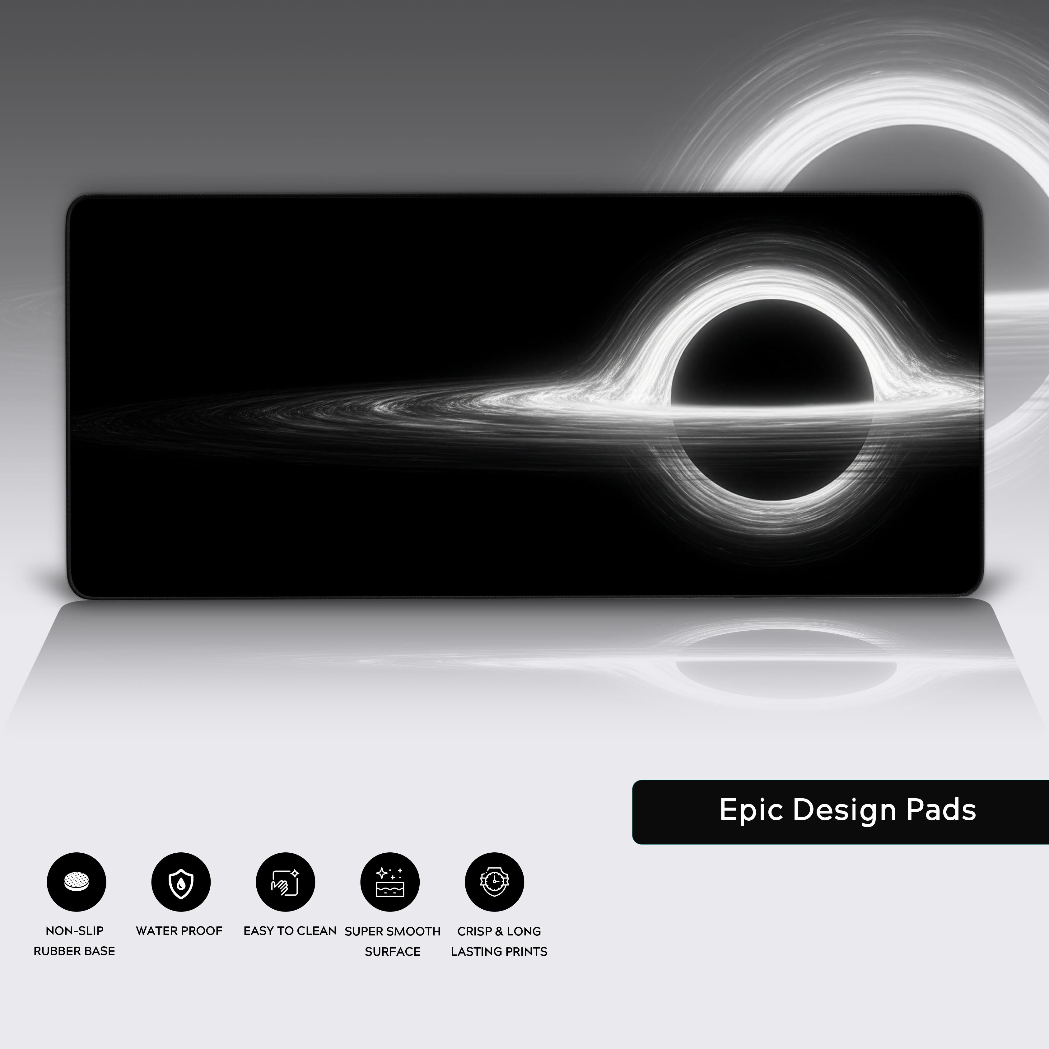 Monochrome Black Hole desk mat highlighting its durable anti-fray stitched edges and the texture of the non-slip rubber base. - Epic Design Pads
