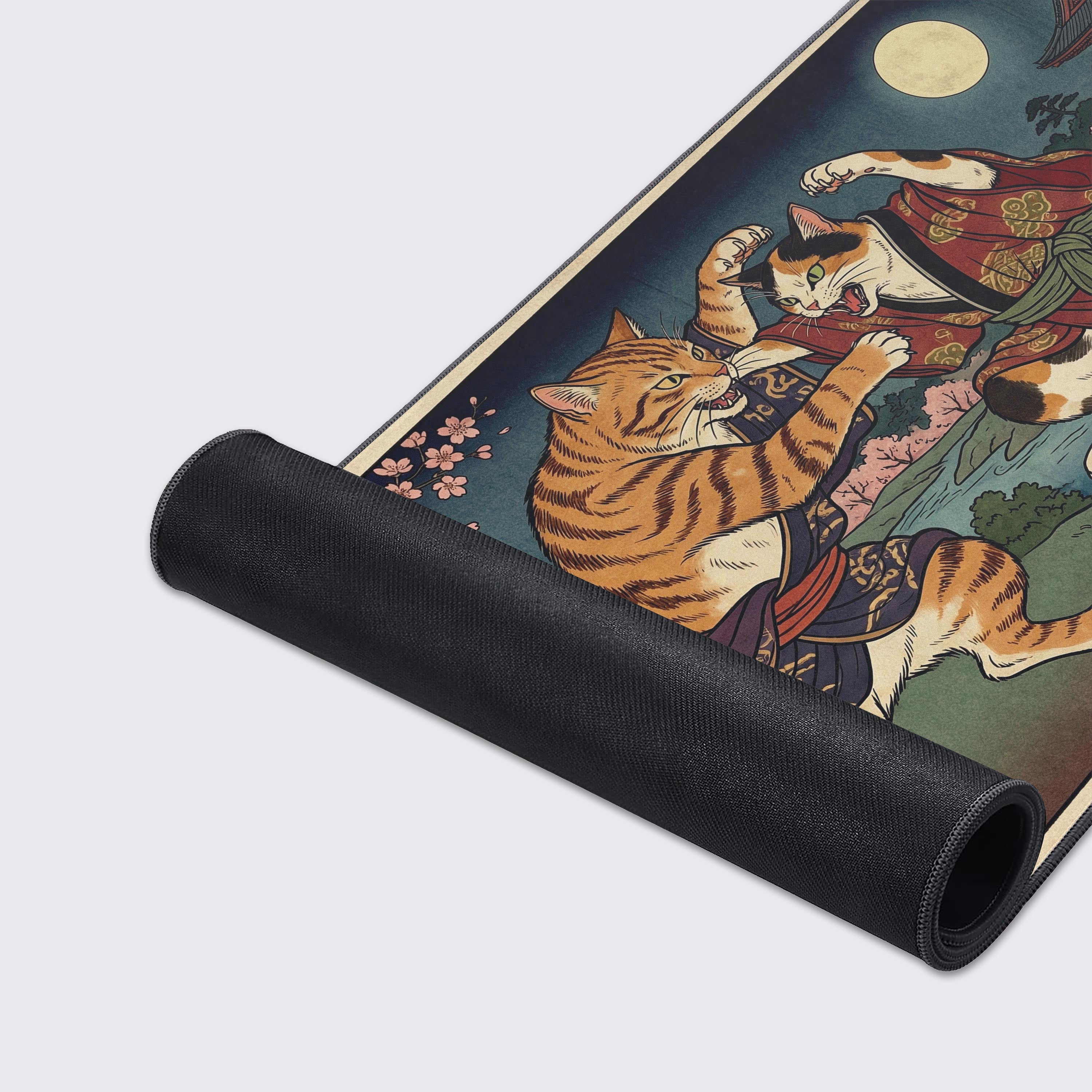 Close-up of the Feline Tussle Japanese desk mat, highlighting the detailed Ukiyo-e art, durable stitched edges, and non-slip rubber base. - Epic Design Pads & Mousepads