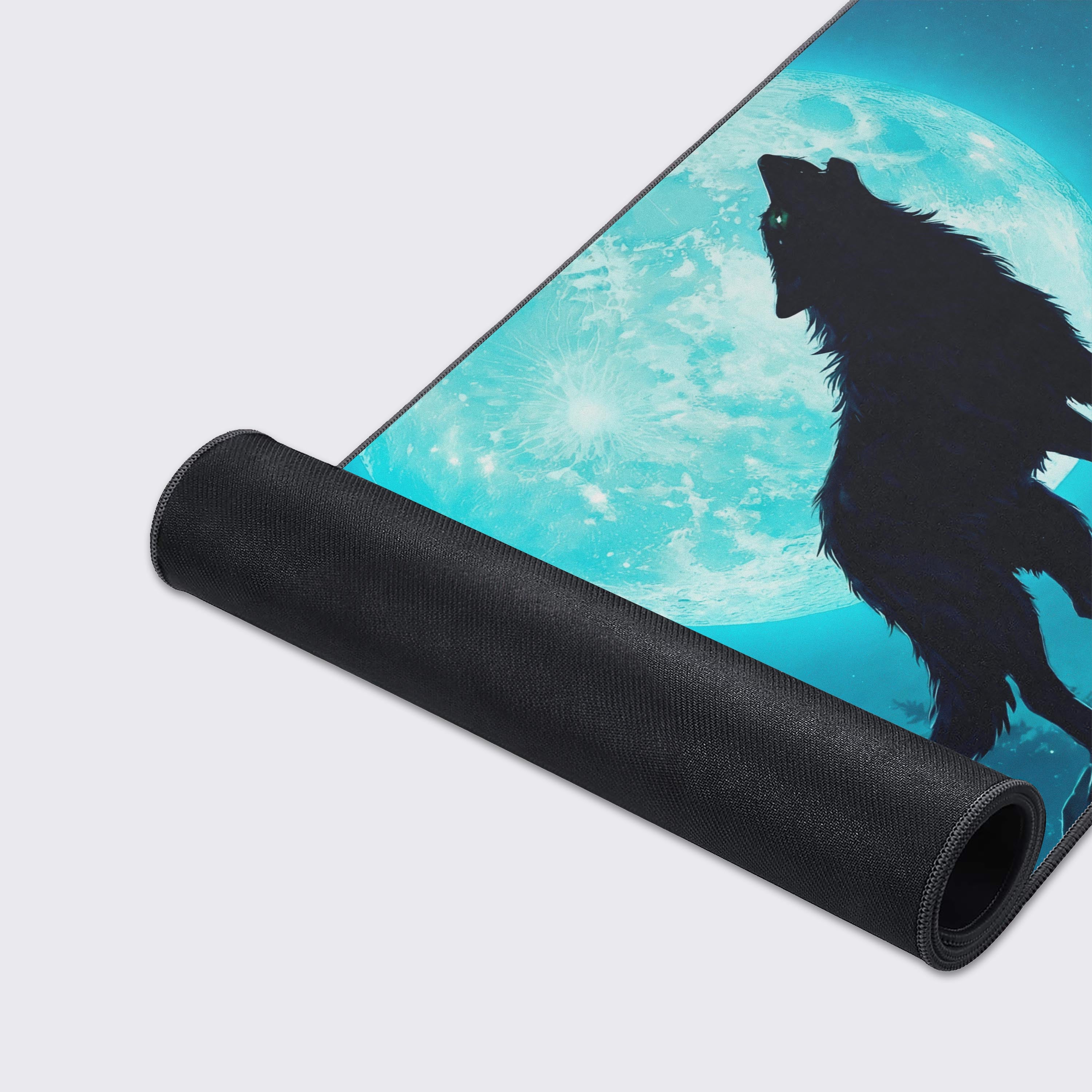 Lunar Call wolf gaming mouse pad with cyan moon art – close-up showing the stitched edges and non-slip rubber base. - Epic Design Pads & Mousepads