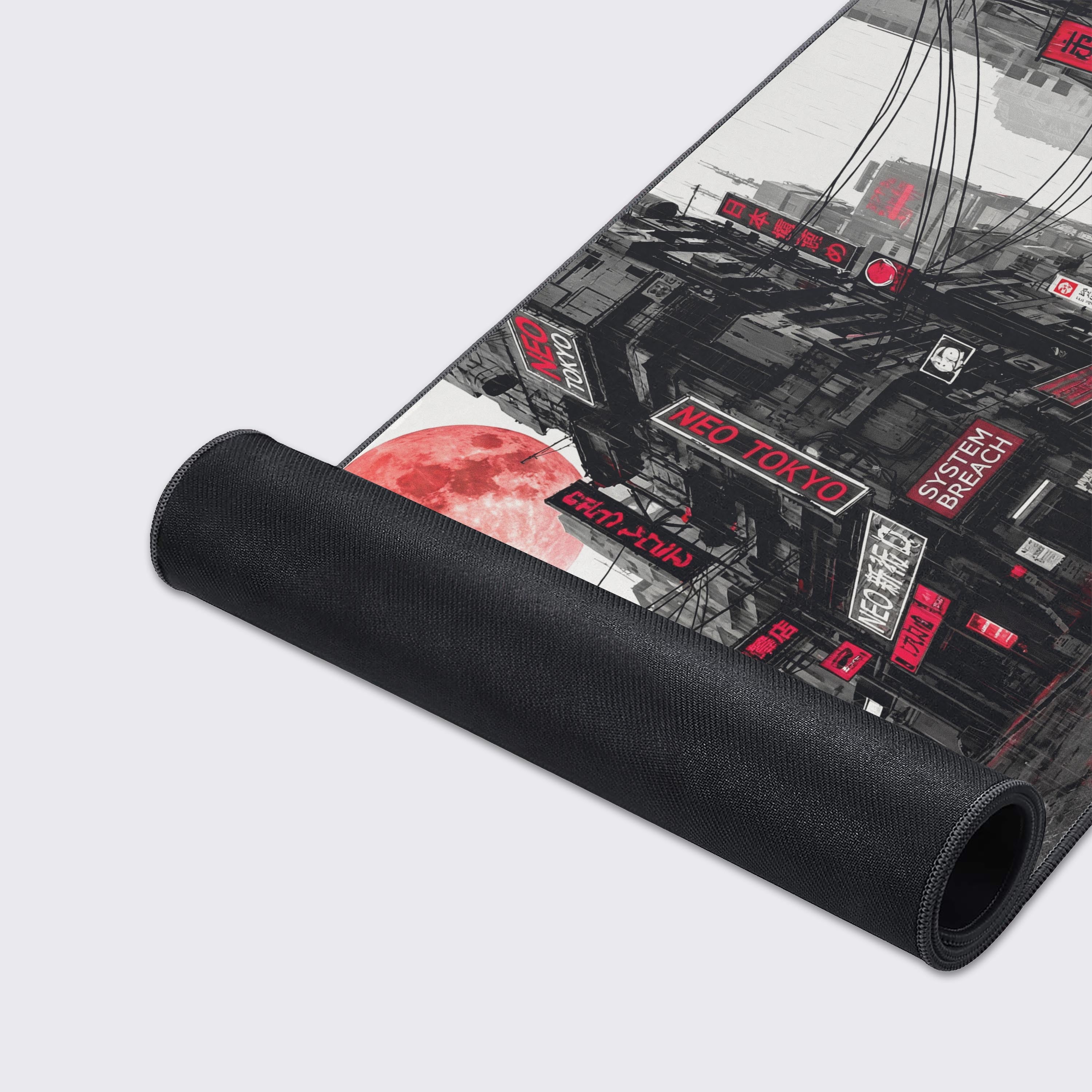 Close-up of the System Breach desk mat showing its durable stitched edges and smooth, water-resistant surface on a non-slip rubber base. - Epic Design Pads & Mousepads