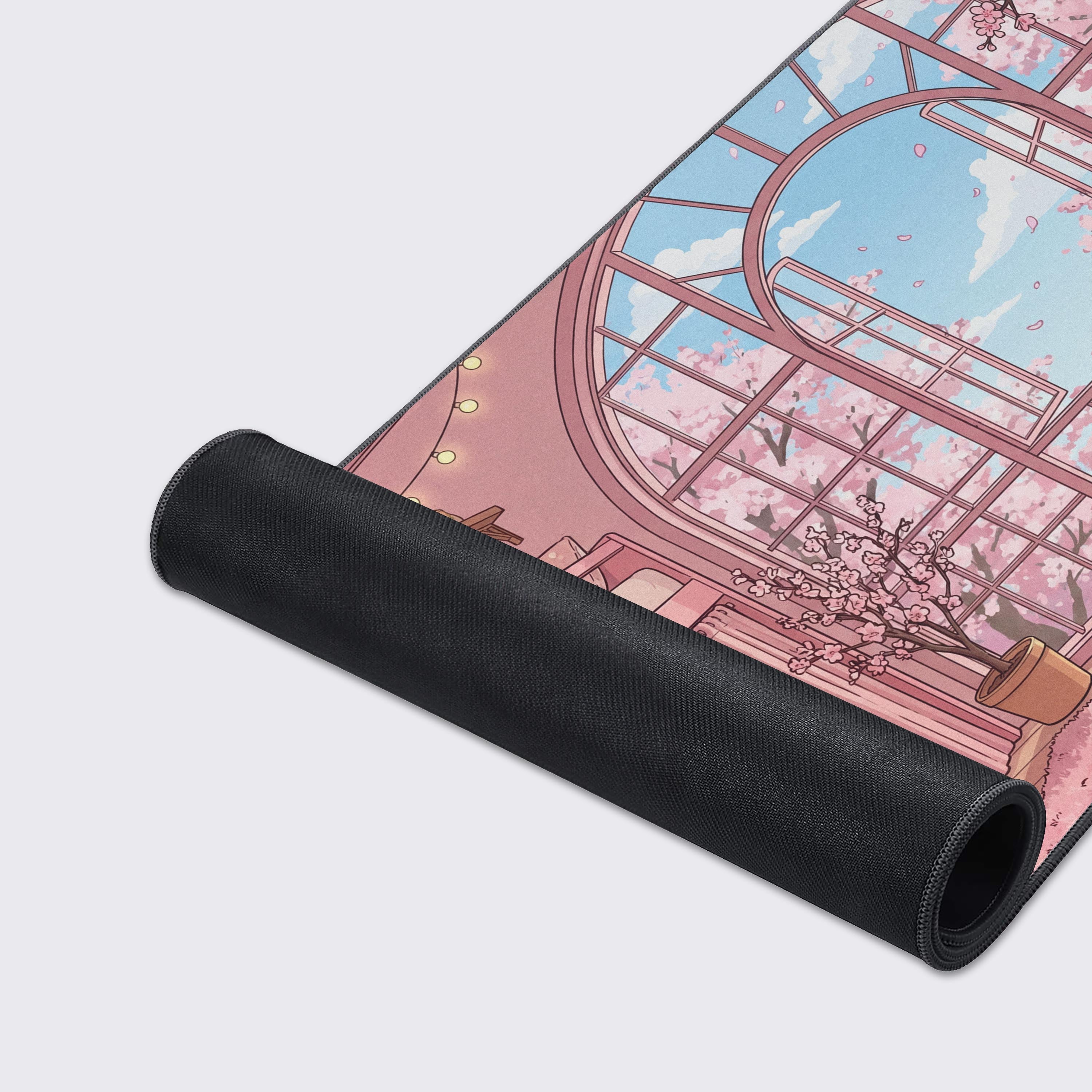 Spring Loft cherry blossom mouse pad showcasing the smooth surface, stitched edges, and non-slip rubber base. - Epic Design Pads & Mousepads